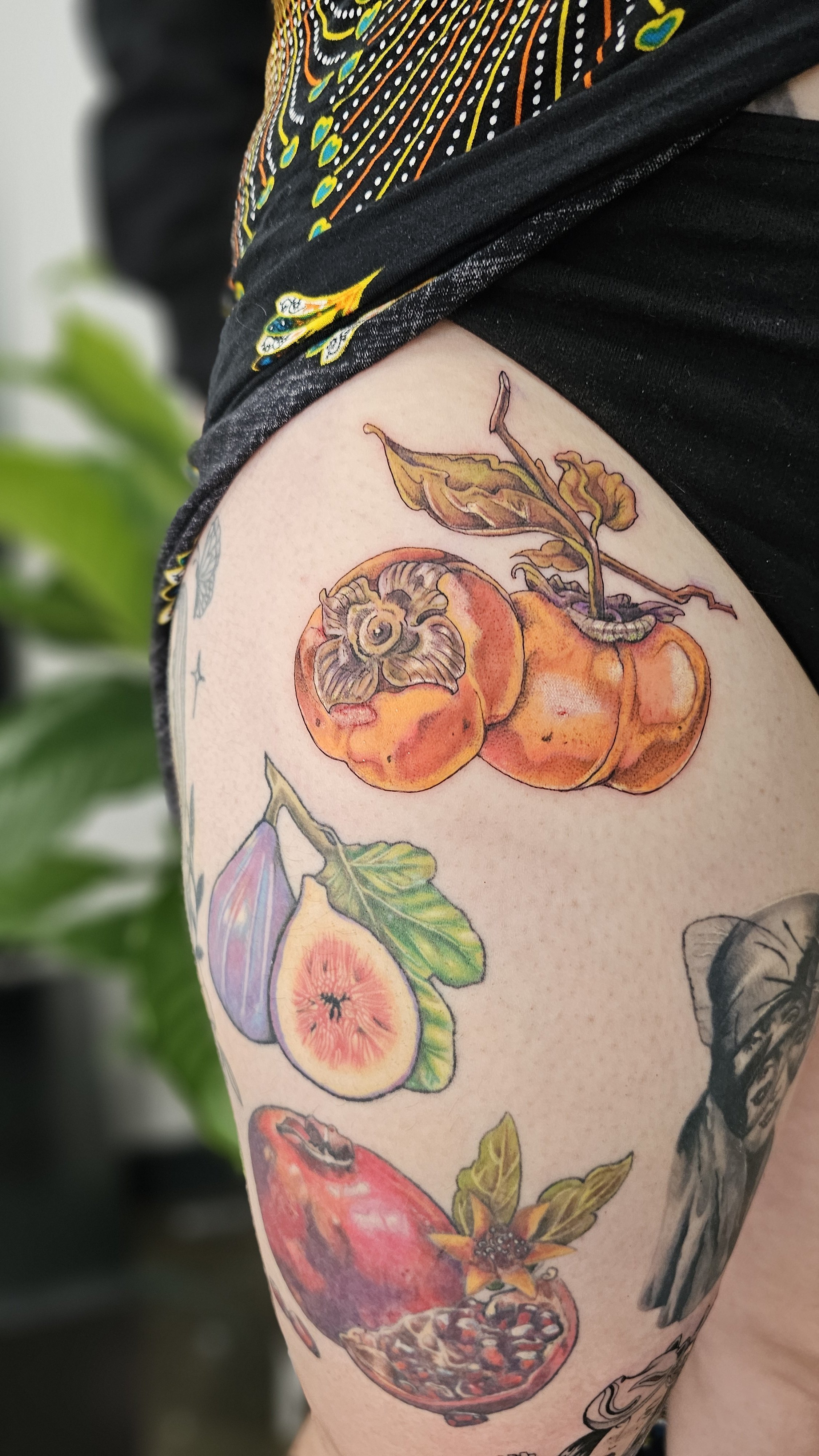 Colourful fruit tattoo