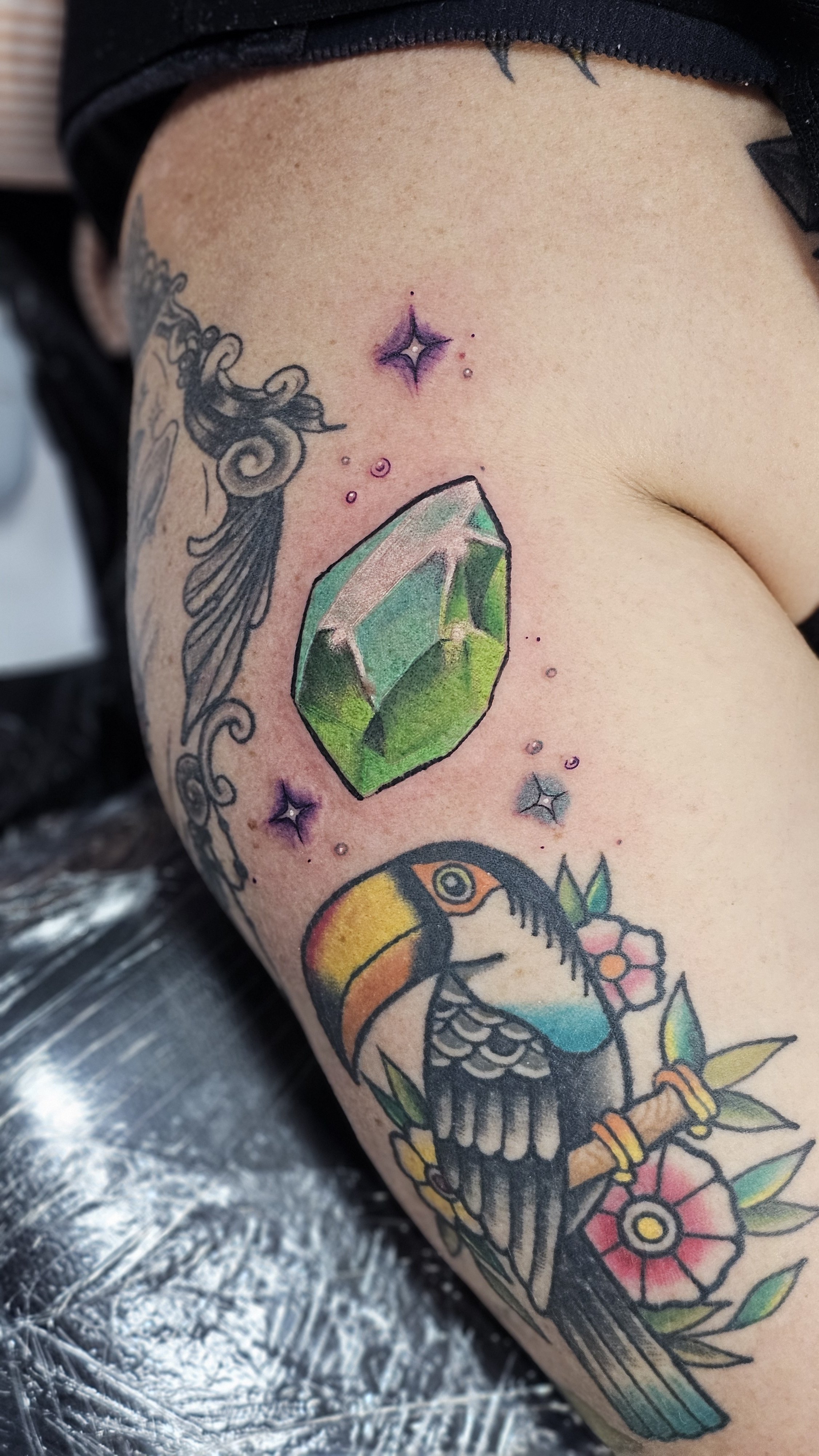 Colour realism gem tattoo