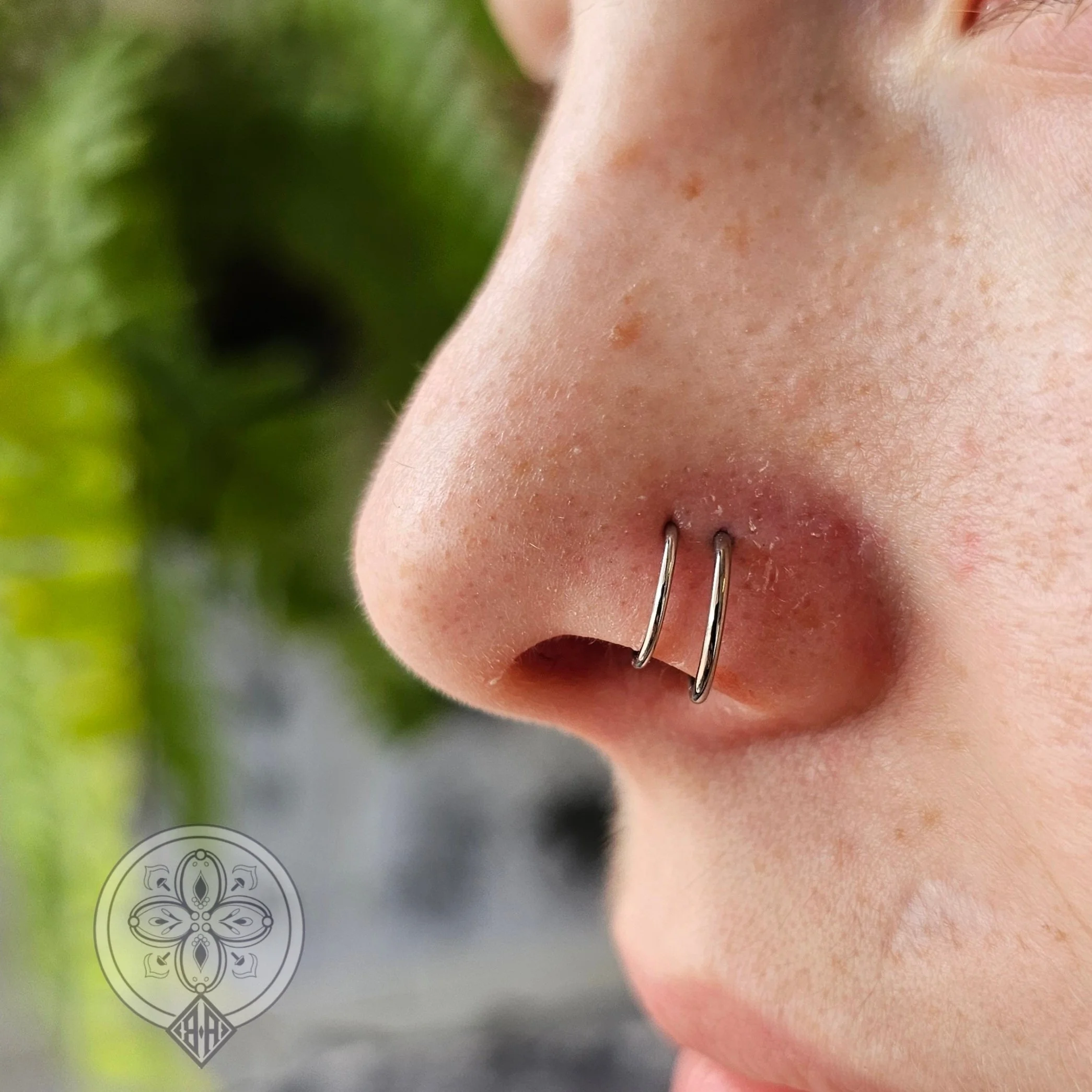 Double Nostril tattoo Hobart