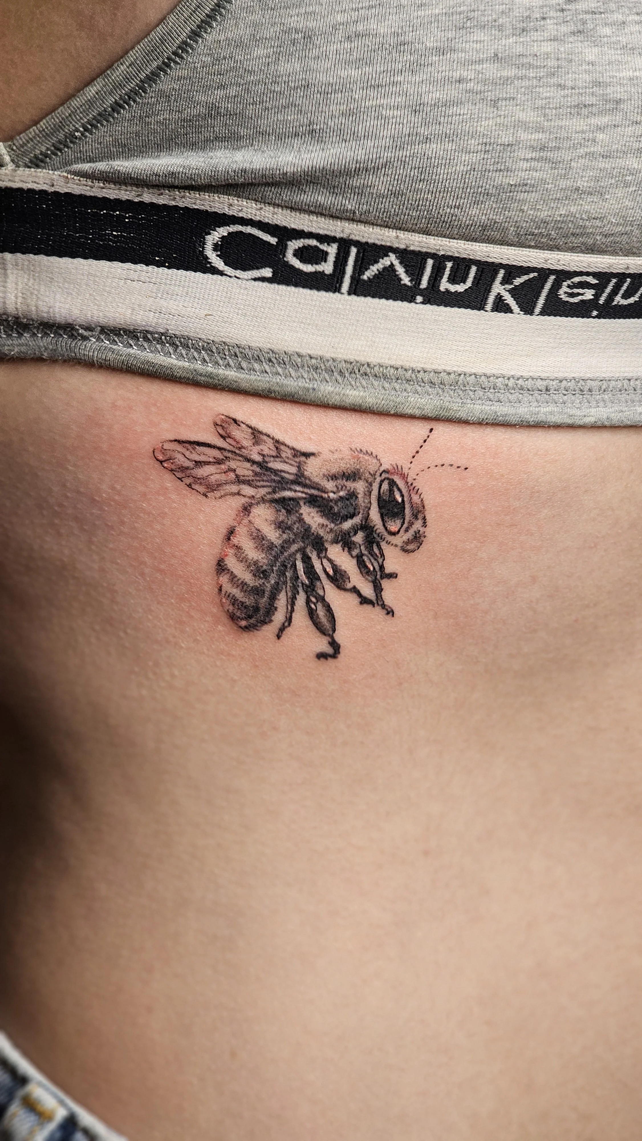 realistic bee tattoo
