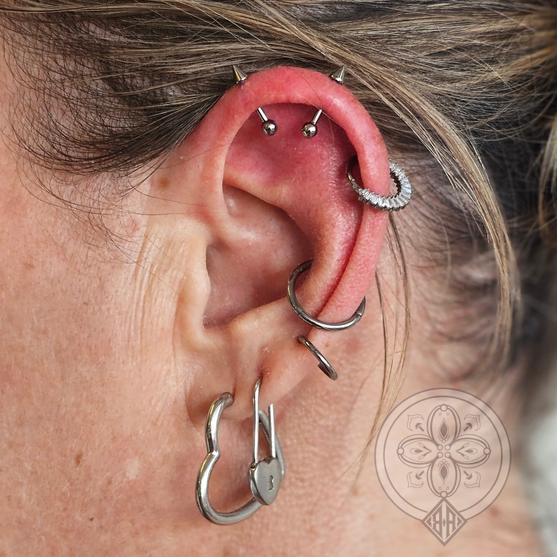 Alternative ear piercing Hobart, Silver punk piercing jewellery.