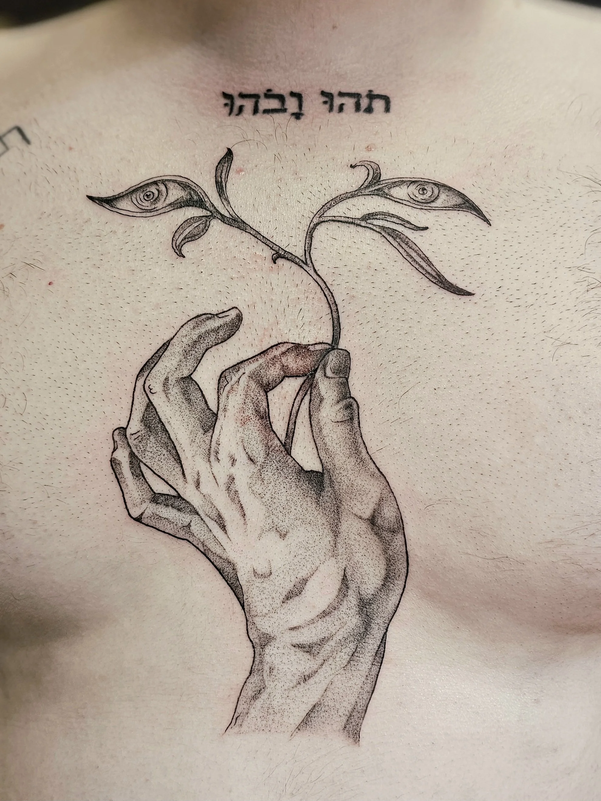 Fineline hand tattoo. Chest Tattoo