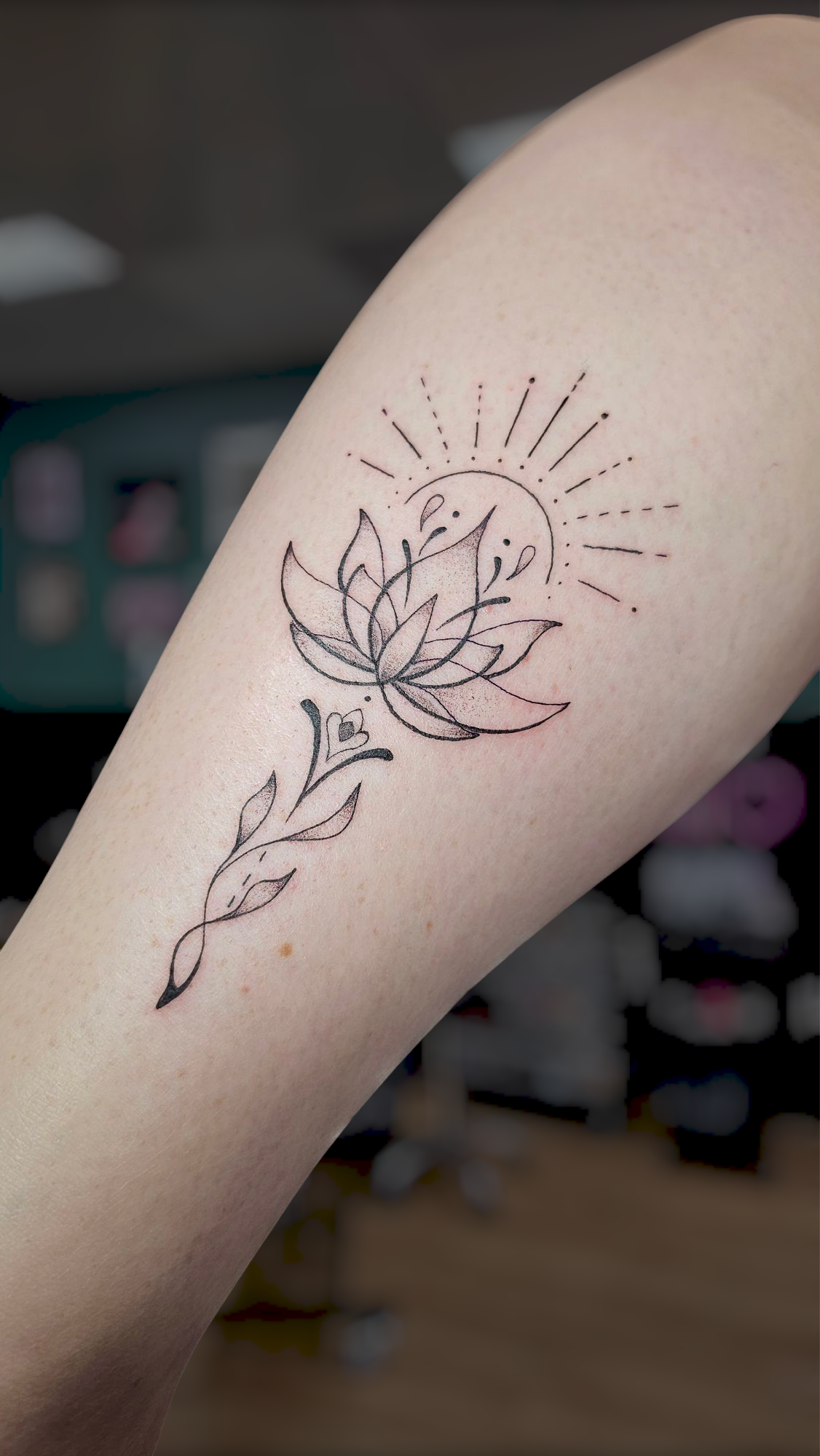 Fineline lotus tattoo 