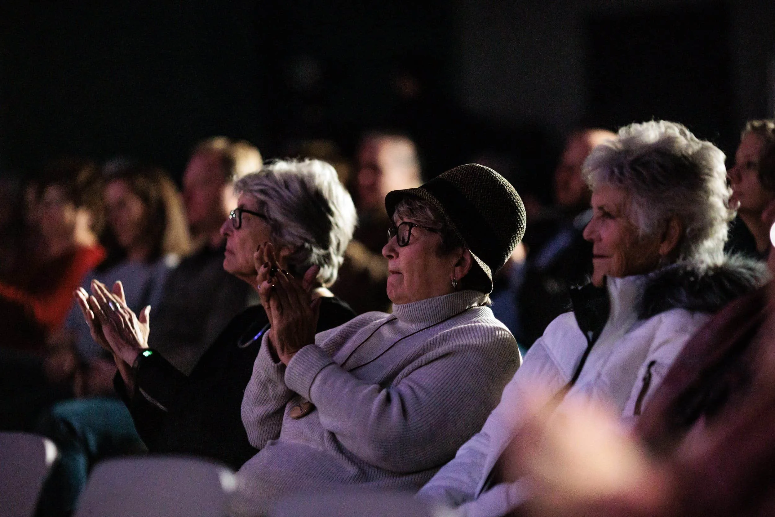 Audience engaged during a Jim Perona keynote concert