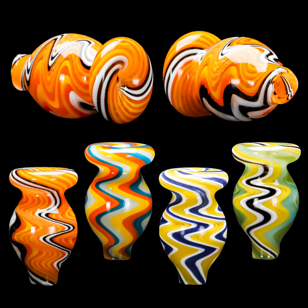 Six colorful swirl vases, four with elongated necks and two with rounded shapes, featuring bright orange, yellow, green, blue, black, and white patterns on a black background.