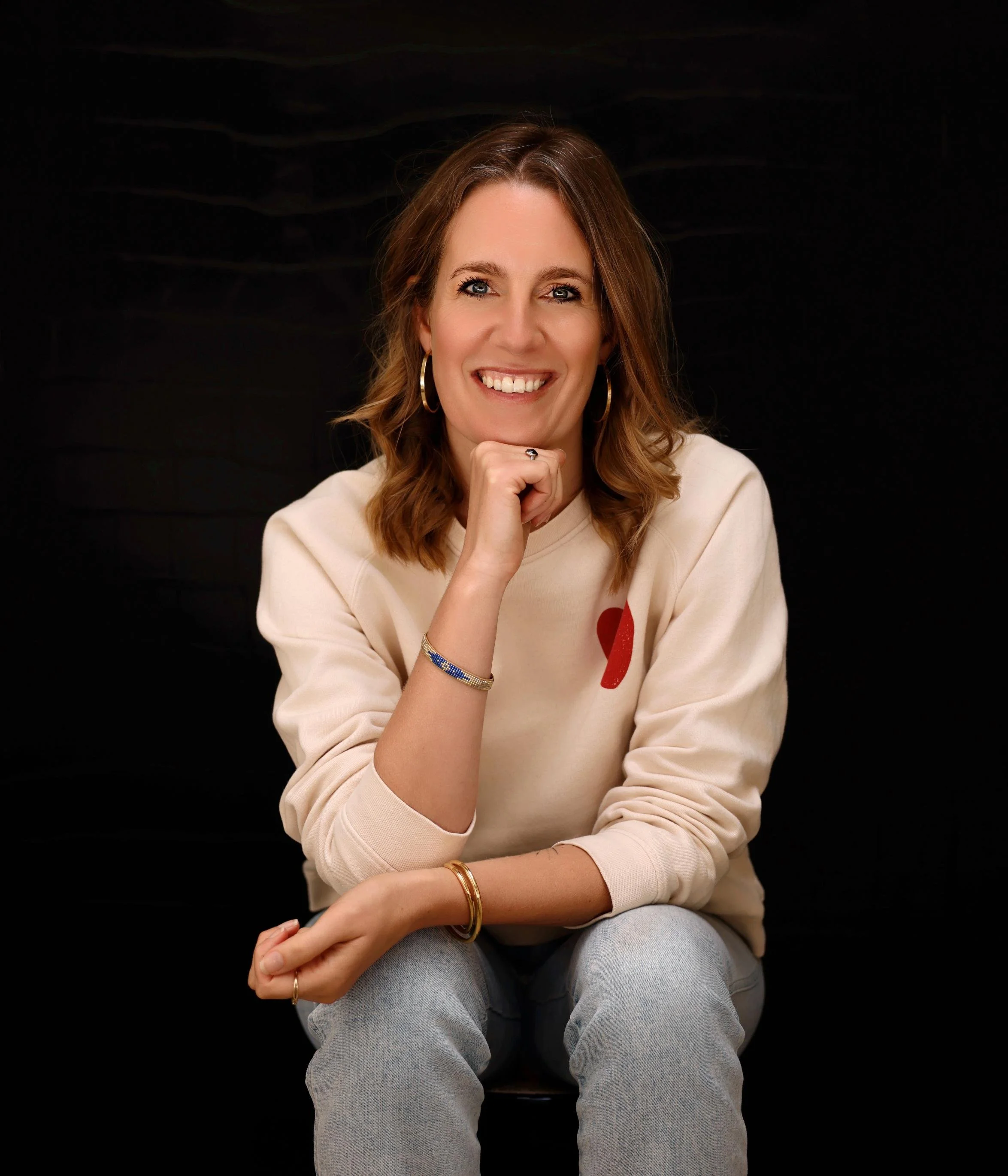 Photo of Anna Teggelaar next to her path and vision on self-healing and inner work