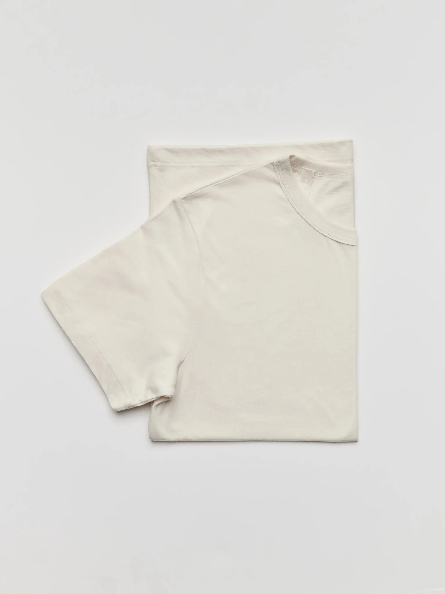 lightweight-organic-cotton-tee-unbleached-flat-lay-maalouf.jpg