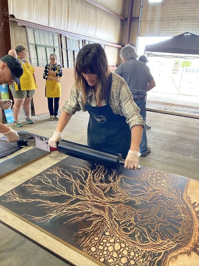 Inking the block for the first time during Really Big Prints, at Hamilton Wood Type Museum July 17, 2025 