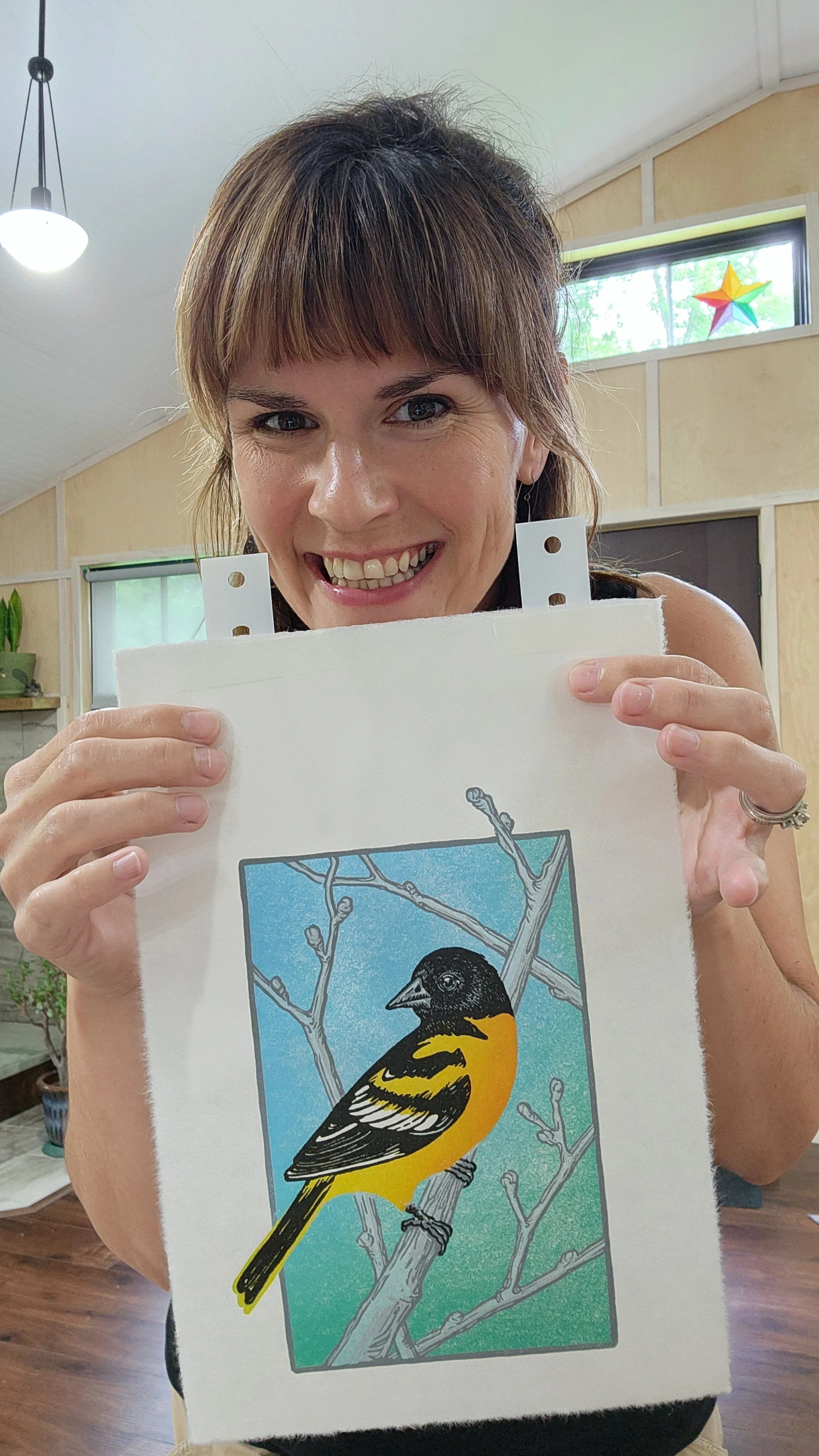 Me and the final layer of my reduction print "The Early Oriole"