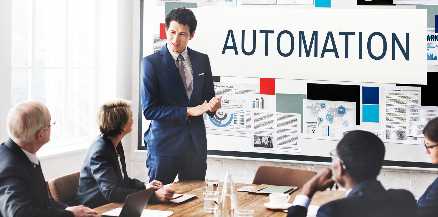 A Tidy Haus consultant presenting automation workflows to a team