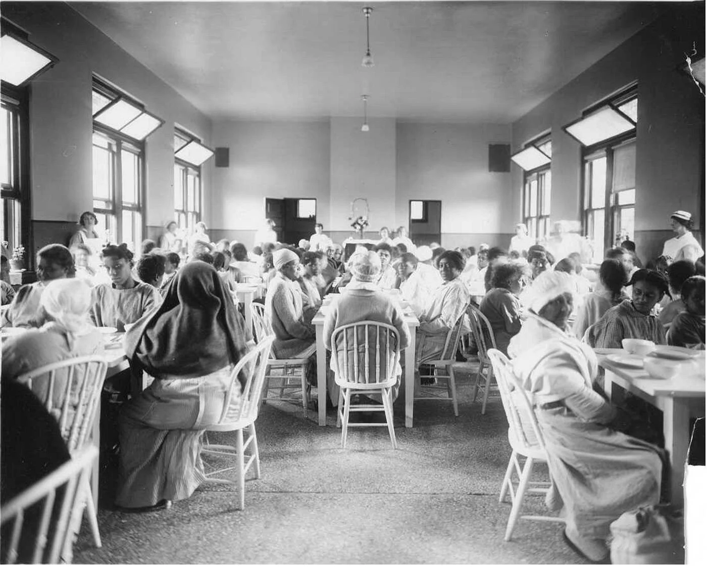Figure 5 Dining Hall for African-American Patients. Segregated facilities at psychiatric hospitals reinforced racial hierarchies under the guise of medical care. Source: https://www.npr.org/sections/health-shots/2017/07/06/535608442/architecture-of-an-asylum-tracks-history-of-u-s-treatment-of-mental-illness