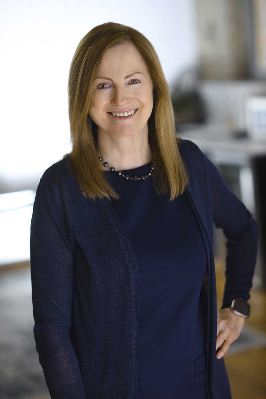 Sharon Mickelson, career coach and founder of Werk It Girls, in a modern office