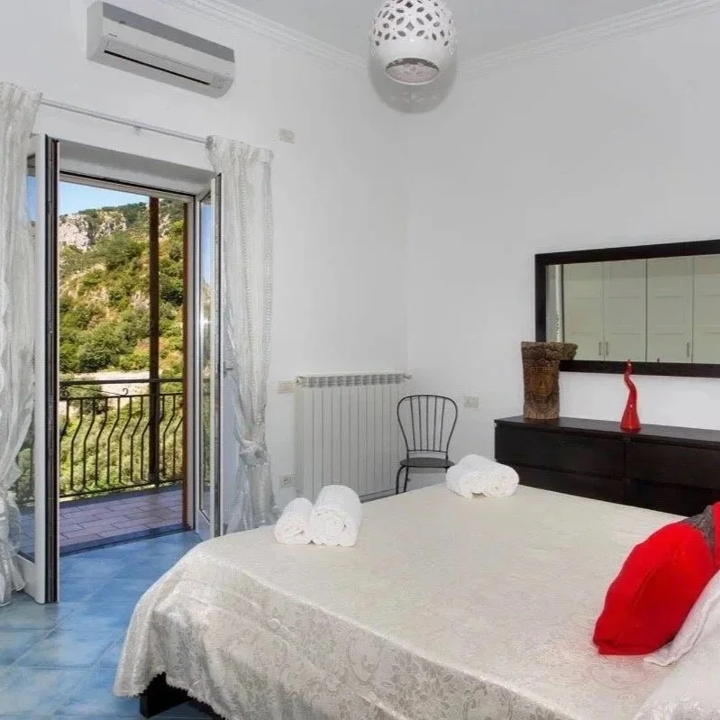 Francesca Room - 2 person room. One shared double bed with private bathroom and balcony (per person pricing - book with a friend)