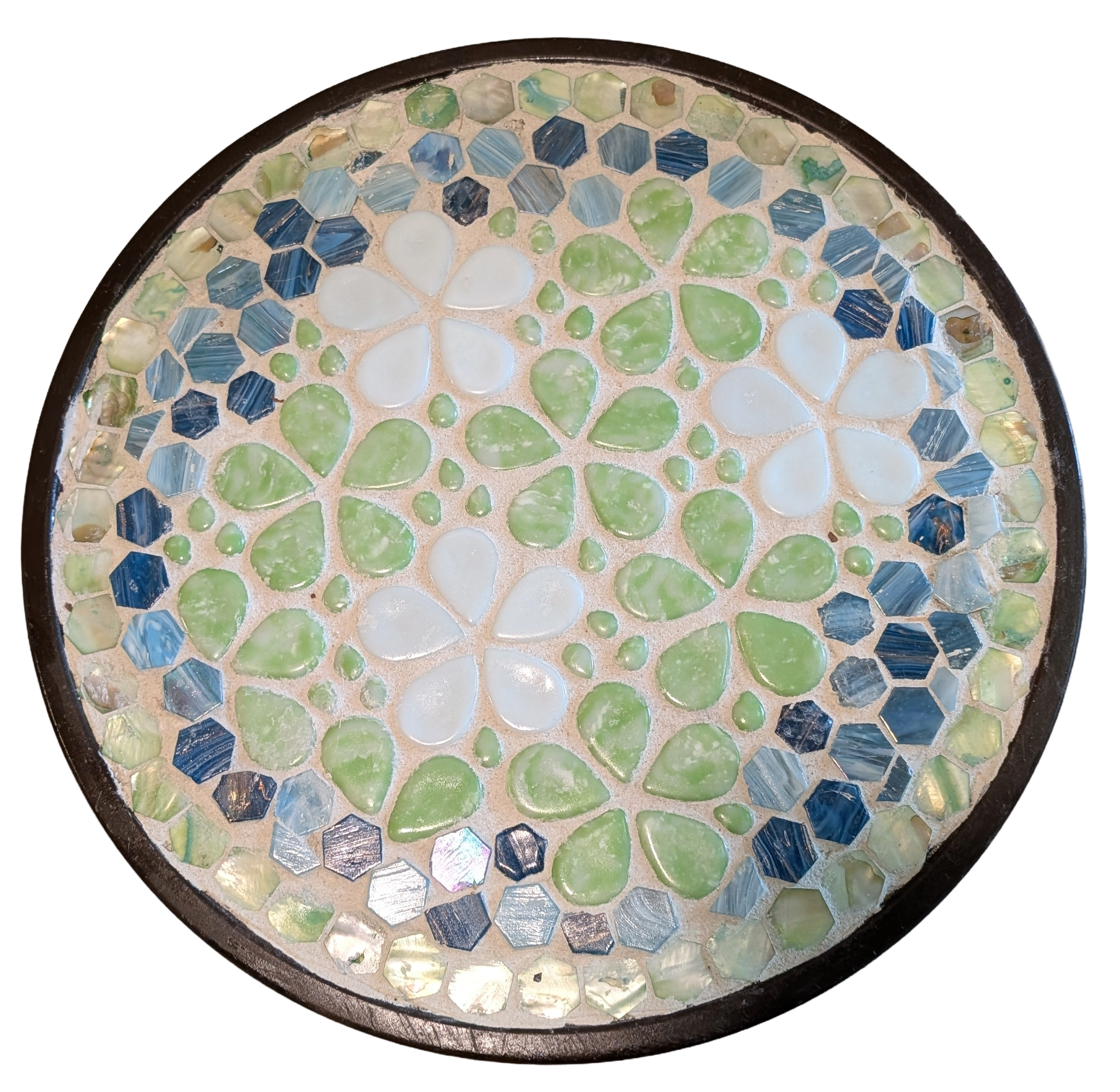 lose-up of ceramic and glass mosaic flower pattern in sea-glass green, white, and indigo blue by Debra Rich