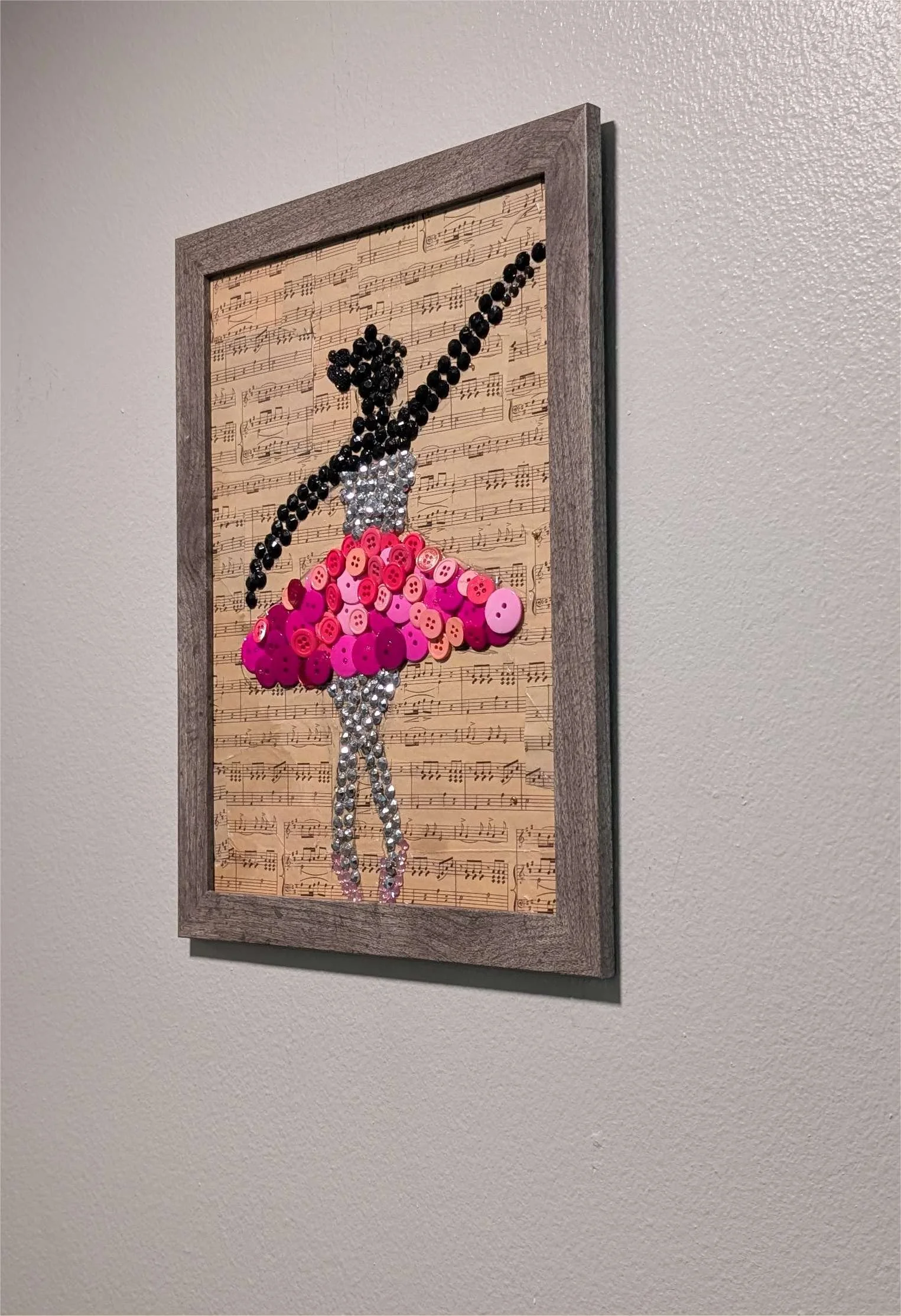 Right side view of Ballet Dancer Button Art by Sarasota Florida artist, Debra Rich showing frame depth and 3D texture