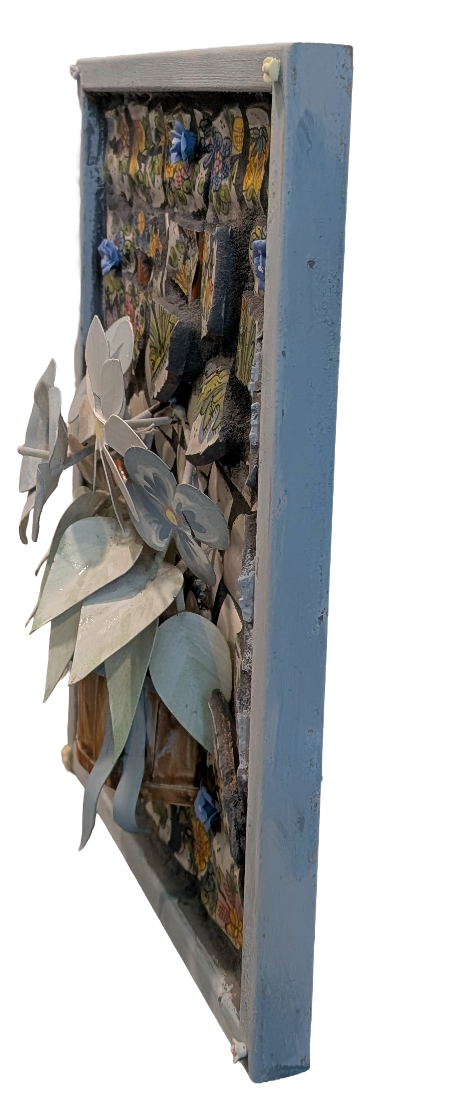 Blooming metal flowers in a pot with flowered mosaics and small flowers as an assemblage art -right side