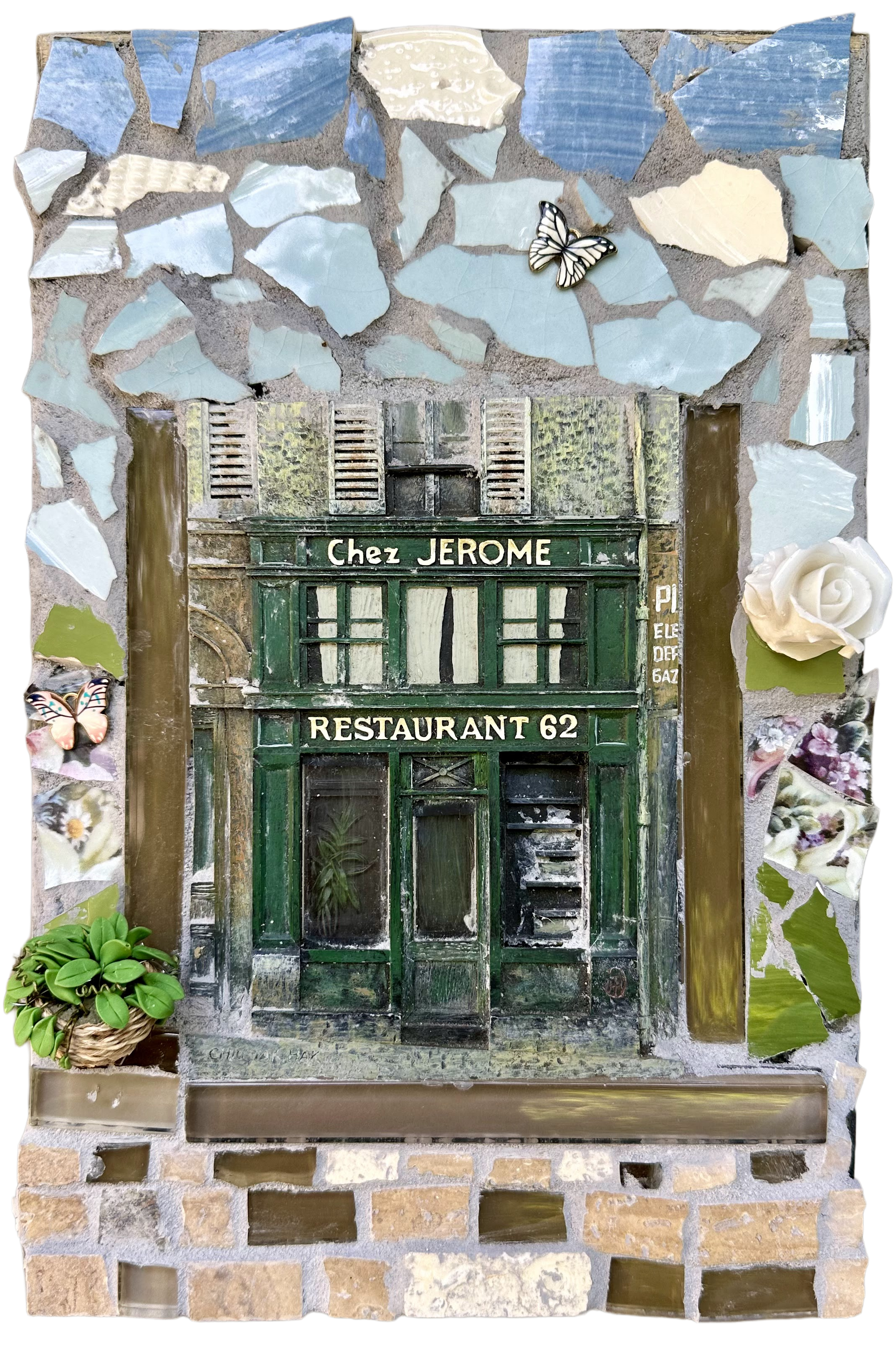 Ceramic mosaic wall art depicting the charming Parisian facade of Chez Jerome Restaurant