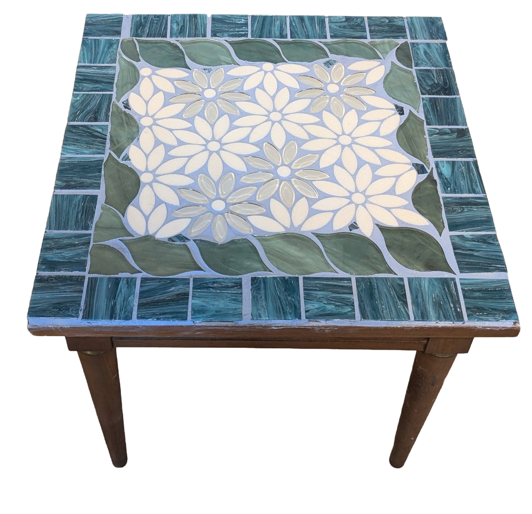 Handcrafted mosaic table depicting a field of daisies surround by blue and green tiles-angle