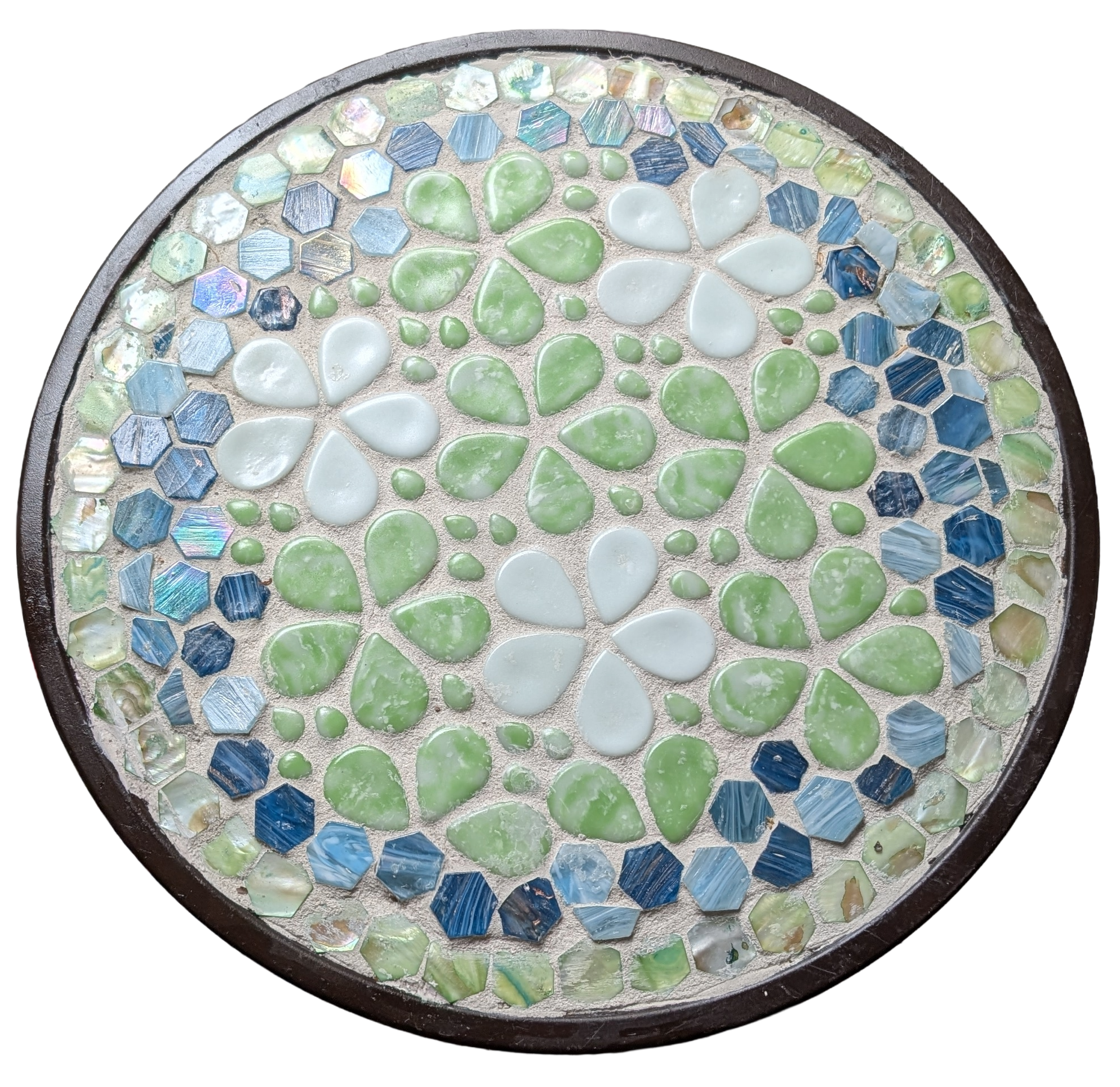 Mosaic tabletop in natural outdoor light showing sea-glass green and blue flower design by Debra Rich