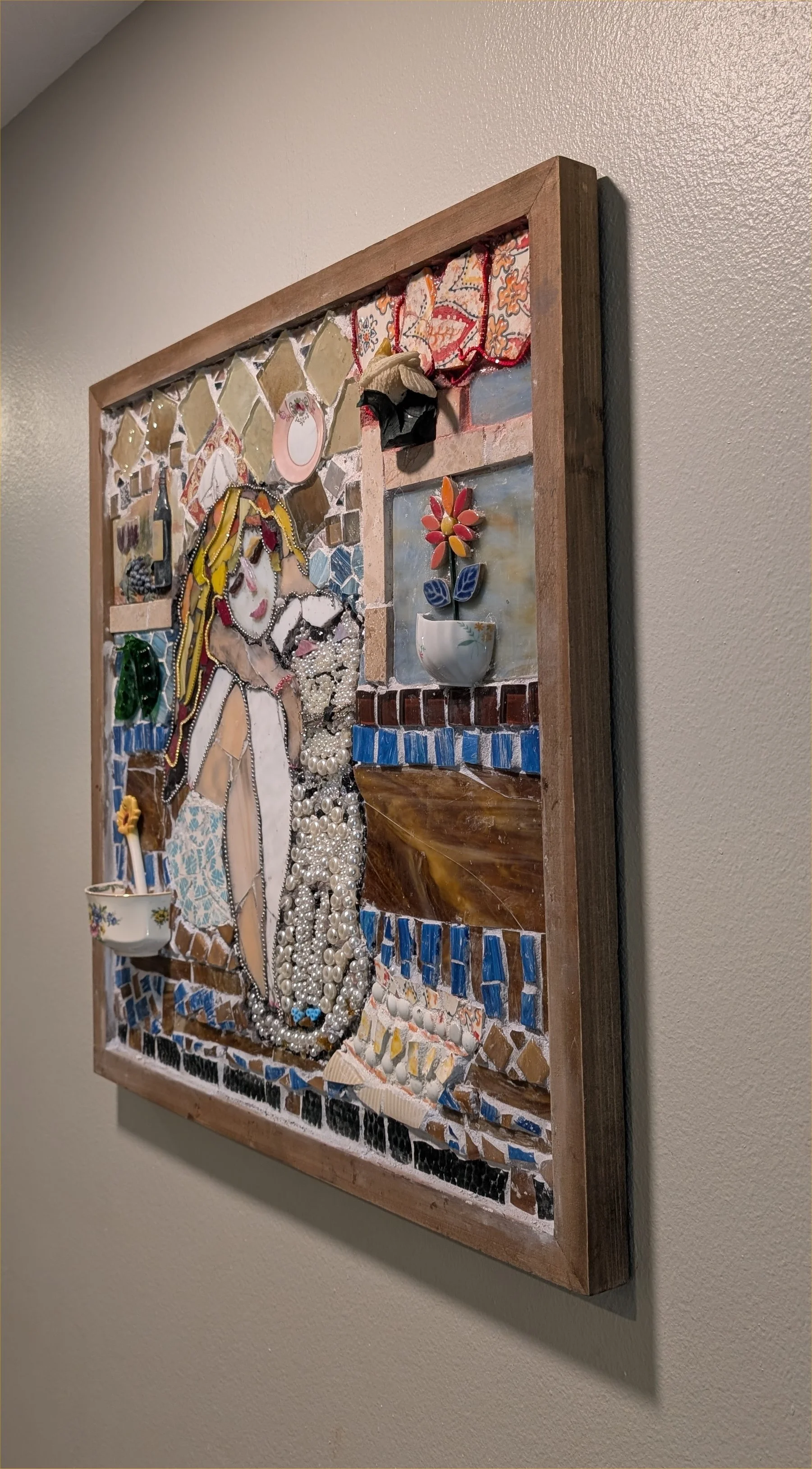 Relaxin' with the Cat mosaic assemblage art by Debra Rich — woman and cat portrait made with tile, glass, and pearls-on wall-right