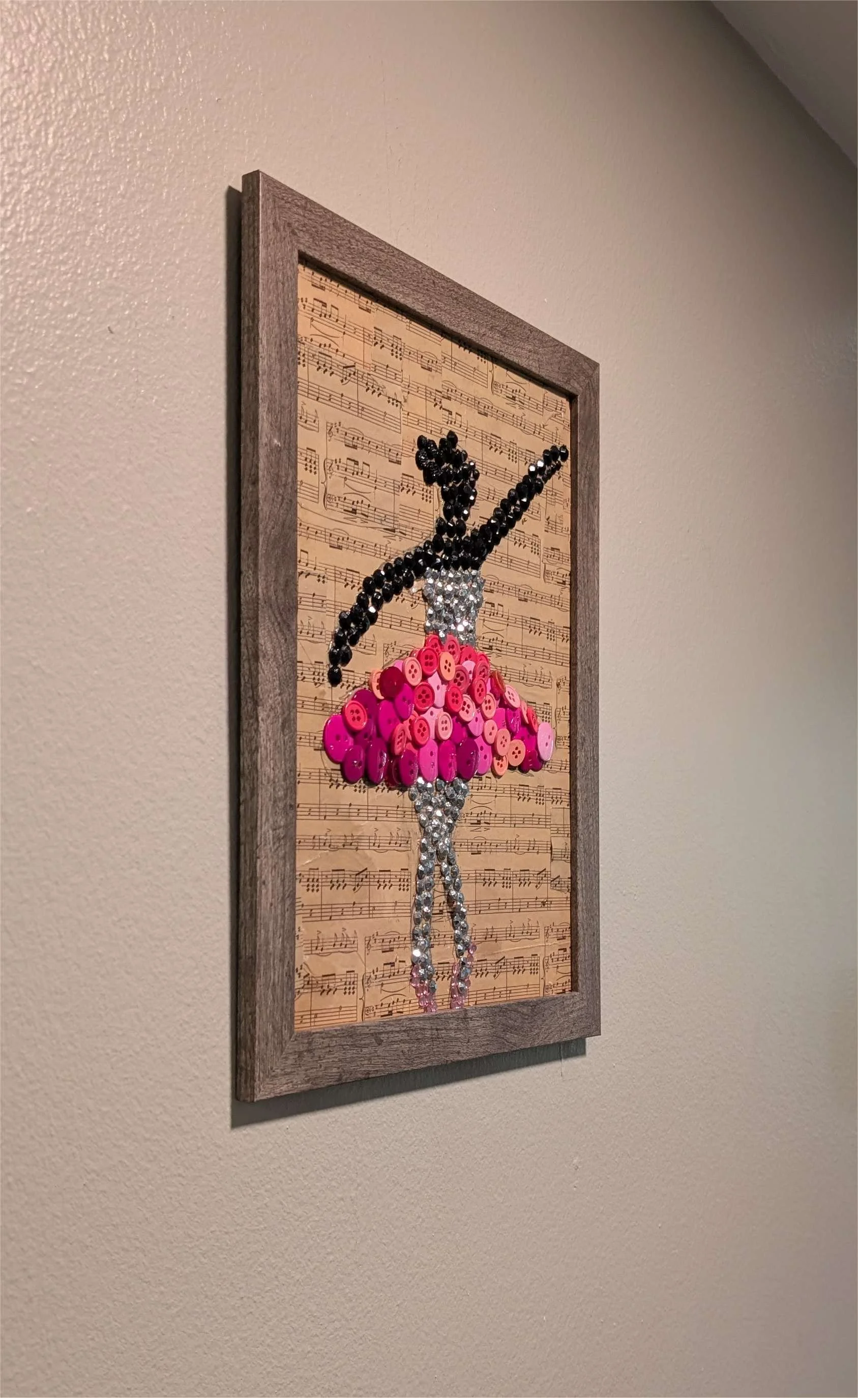 Left side view of Ballet Dancer Button Art by Sarasota Florida artist, Debra Rich showing frame profile and raised construction