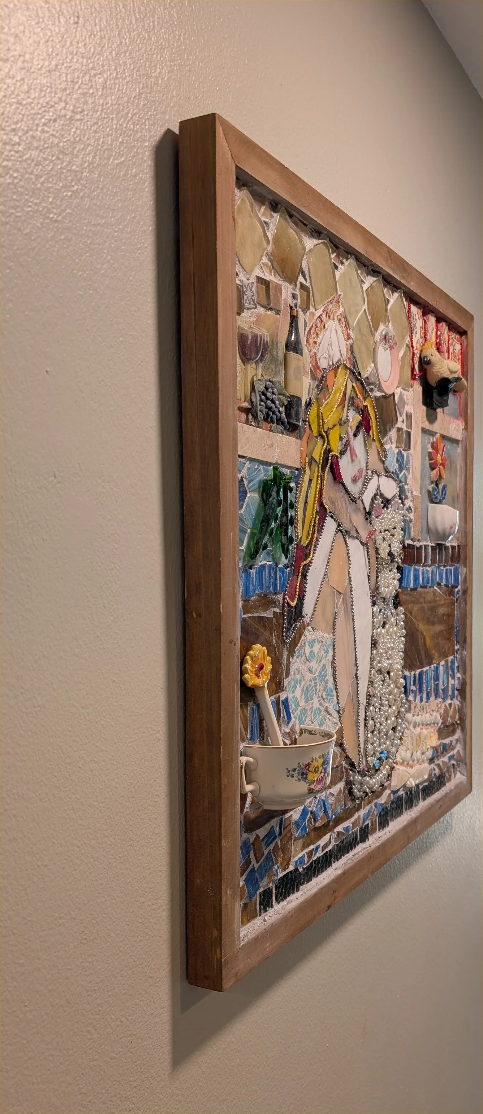 Relaxin' with the Cat mosaic assemblage art by Debra Rich — woman and cat portrait made with tile, glass, and pearls-on wall-left