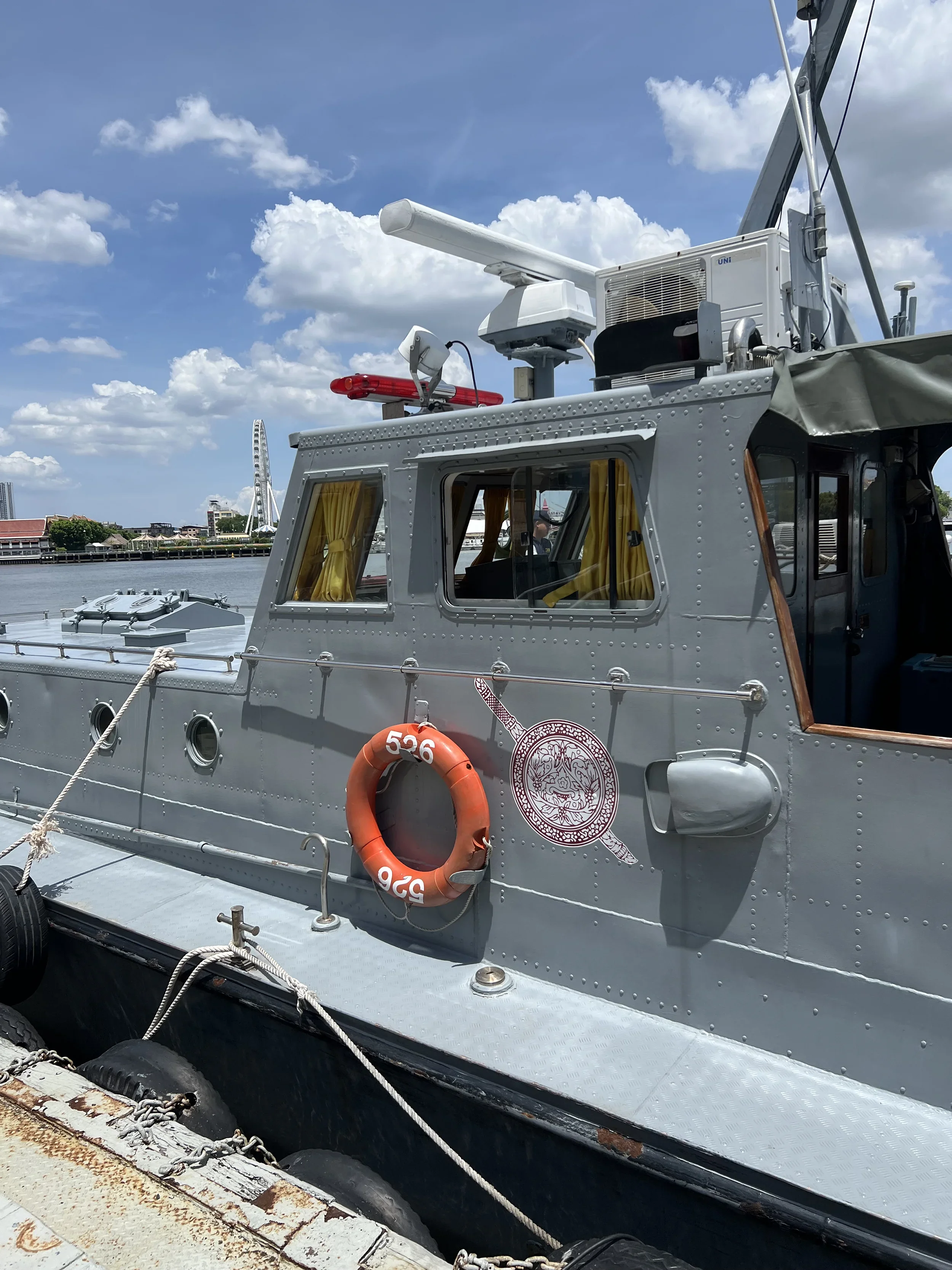 Coast guard vessel docked at harbor