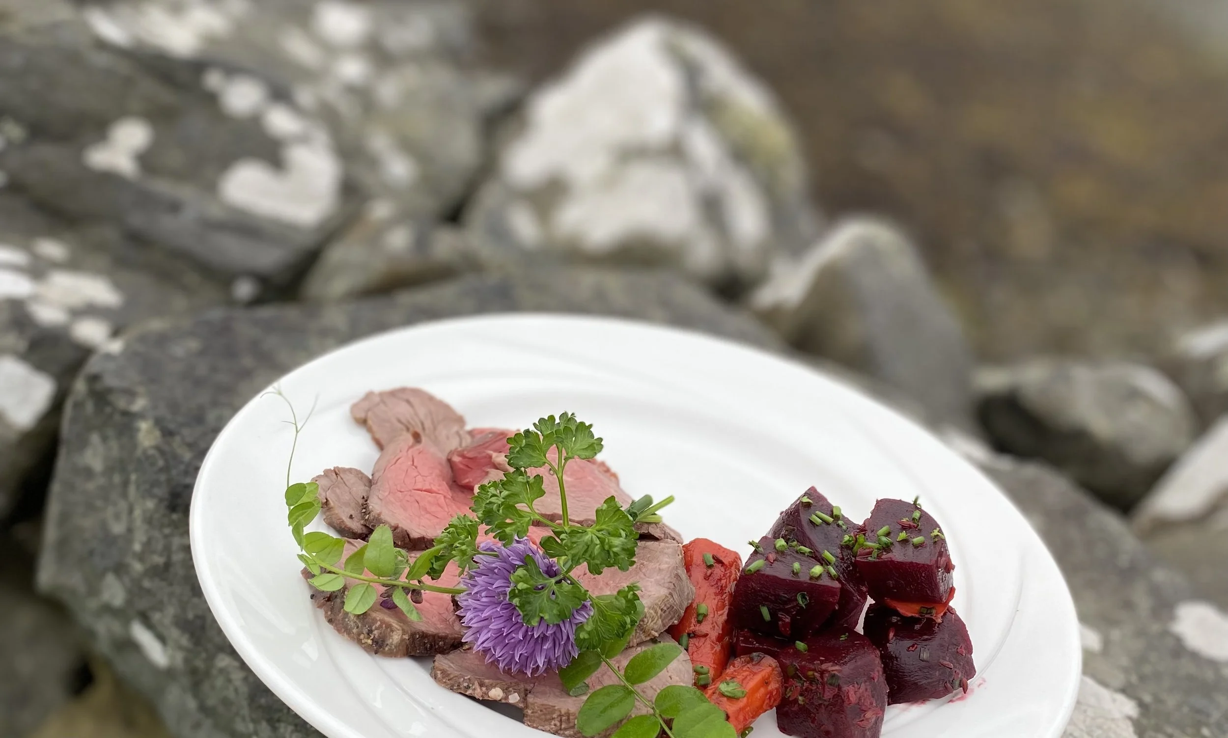 Rare fillet of beef with beetroot, carrot & caraway salad