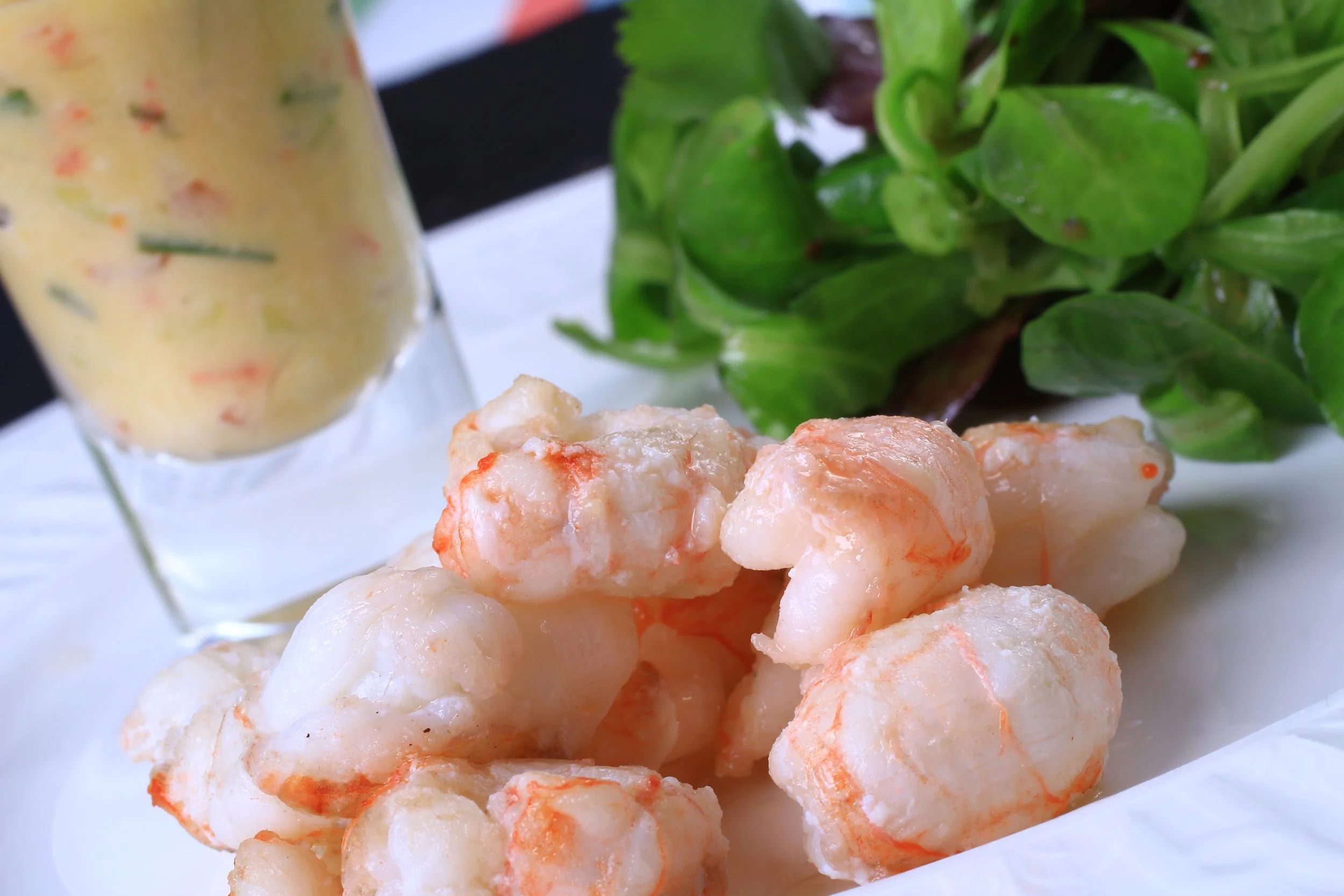 Dublin bay prawns with chilli, lime, avocado and tomato in a shot glass 