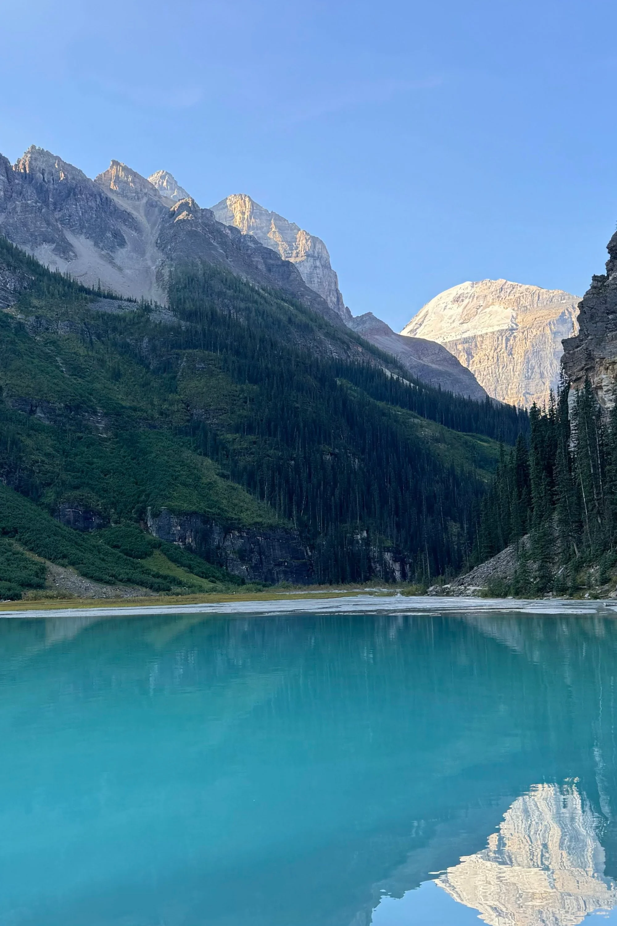 The breathtaking turquoise waters and snow-capped peaks of the Canadian Rockies high country.