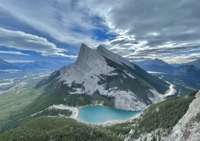 Ha Ling Peak rising above a turquoise lake and the Bow Valley near Canmore