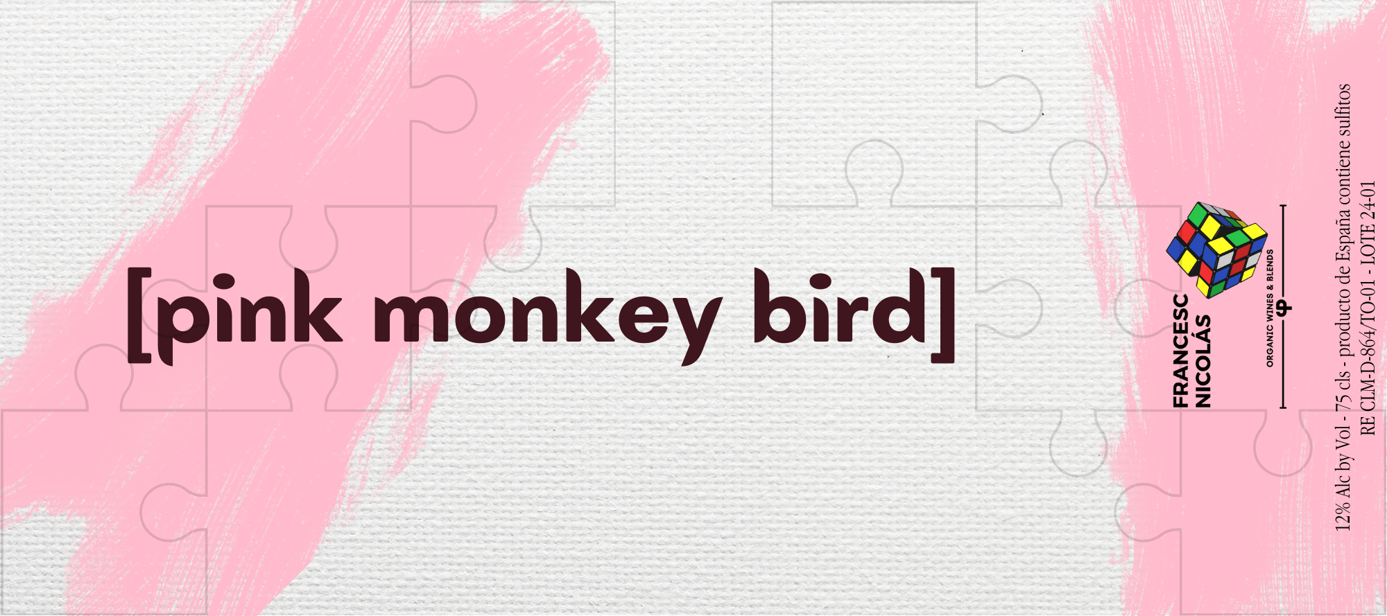 Una caja de rompecabezas con la marca 'Pink Monkey Bird' en letras negras y el fondo de la caja tiene un diseño de rompecabezas en color rosa y gris.