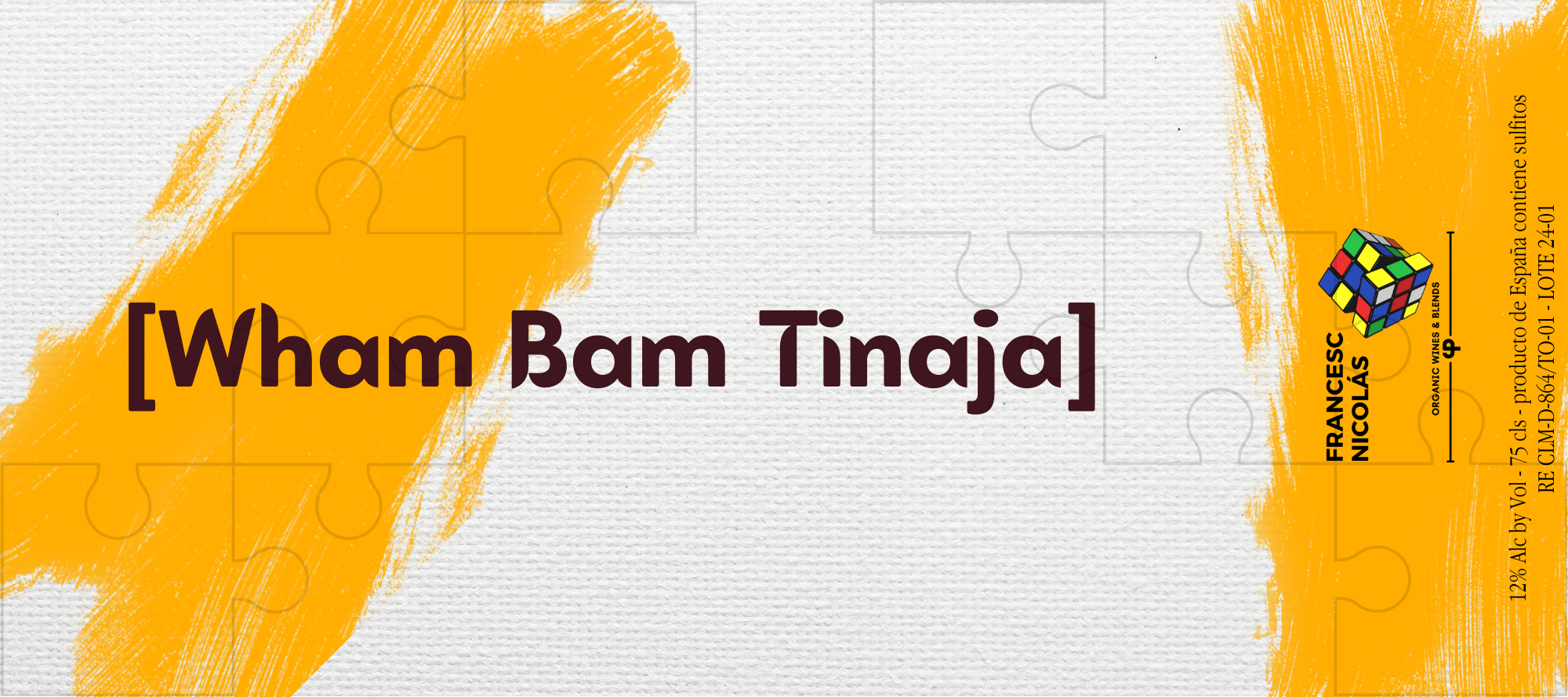 Etiqueta de producto de vino orgánico de España con diseño de rompecabezas y una imagen de un cubo de Rubik.