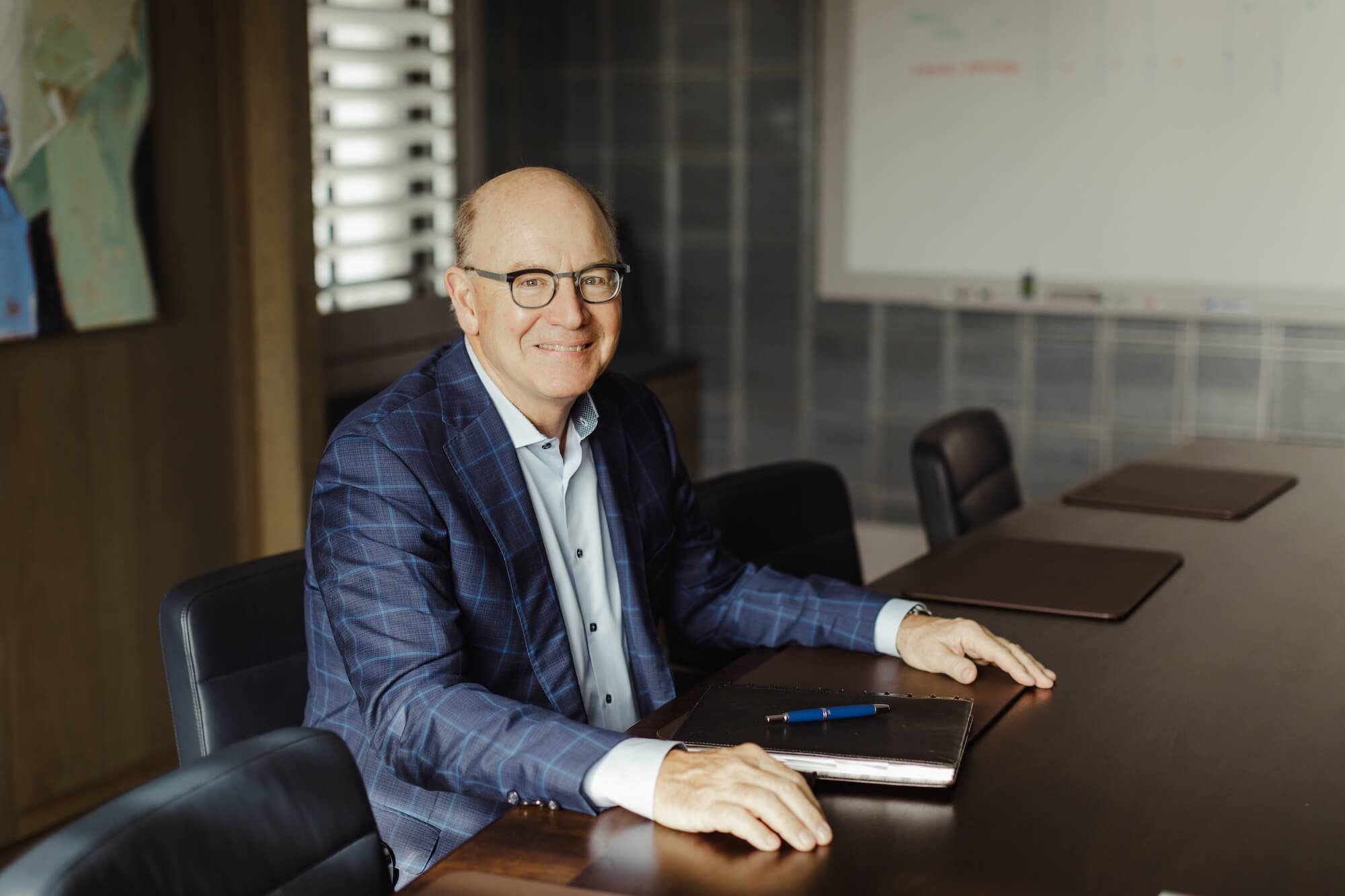 Bill Boer in the Grey Dunes office at the conference table.