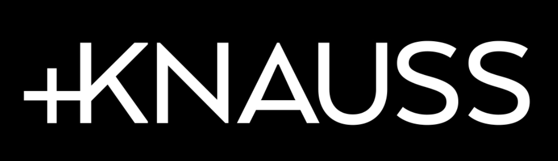 White text on black background displaying '#KNAUSS' with a slash through the first letter.