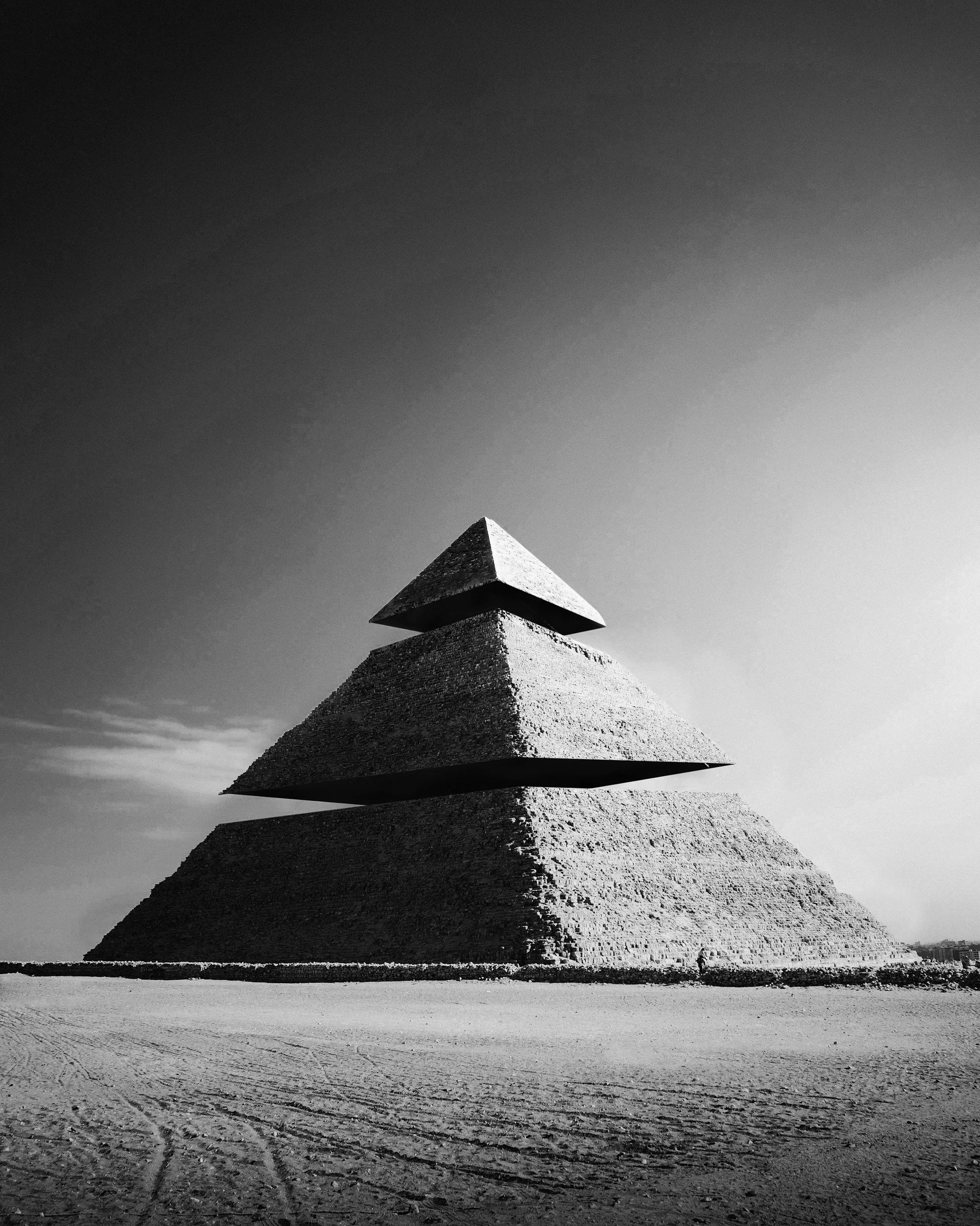 Pyramid, featuring four stacked sections with the top section resembling a pyramid.