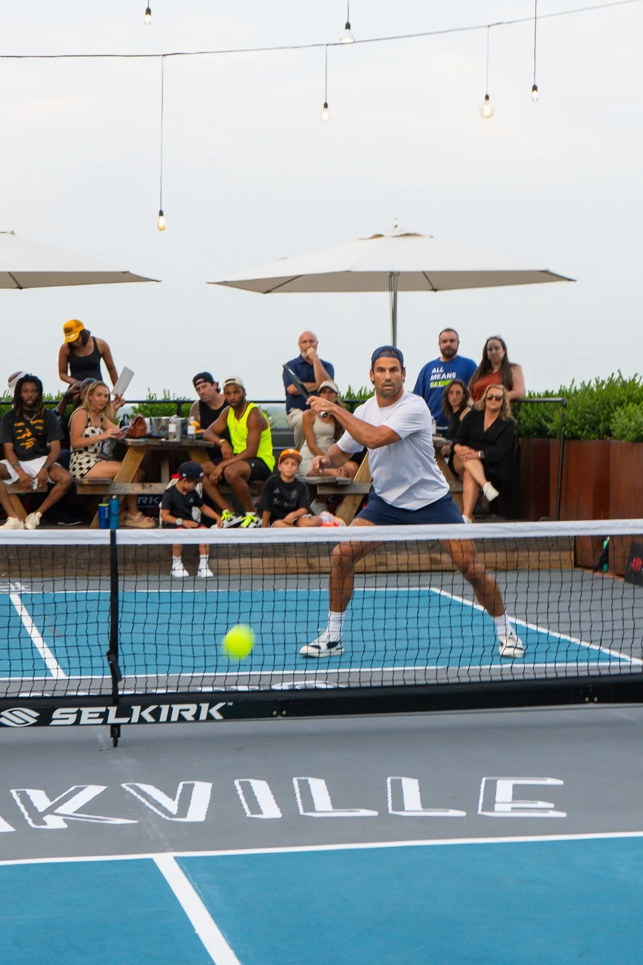 Decker forehand action shot HPN.jpg