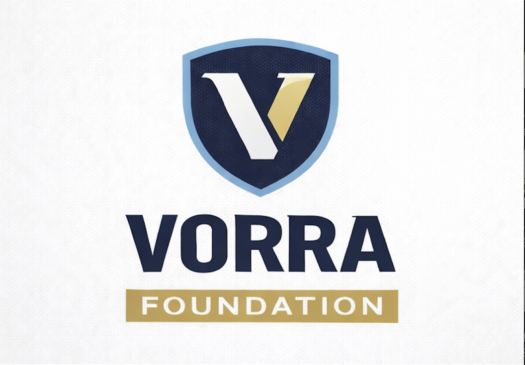 Vorra Foundation logo featuring a shield with a stylized letter V and a gold accent, with the words 'Vorra Foundation' below.