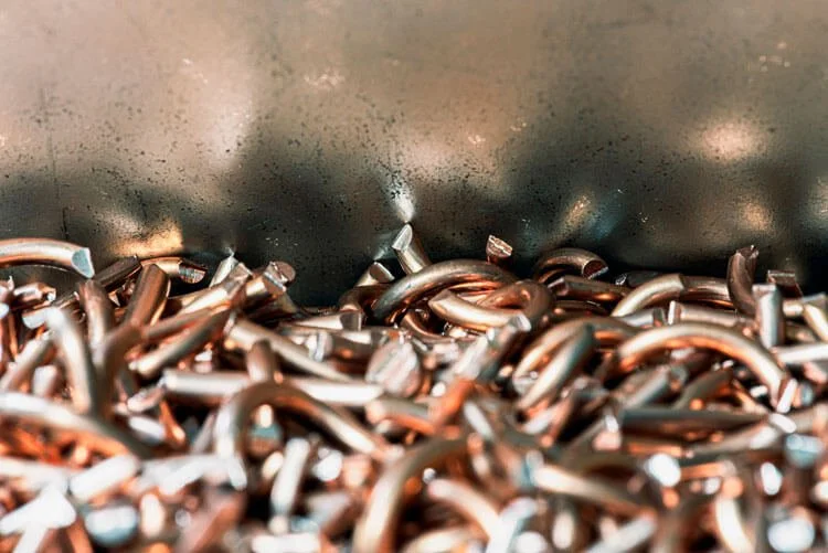 Mixed metal pieces for reclamation and material separation processing.