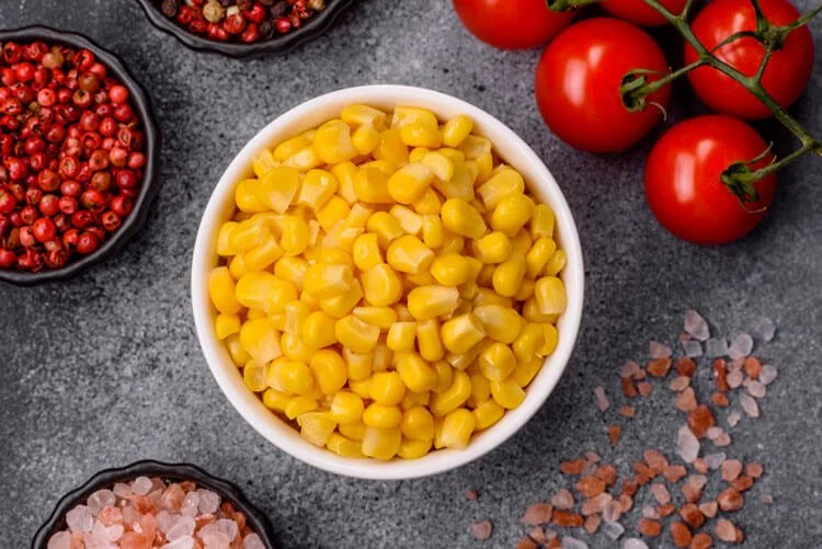 Corn kernels and other food ingredients representing food processing applications served by Oliver Manufacturing.”