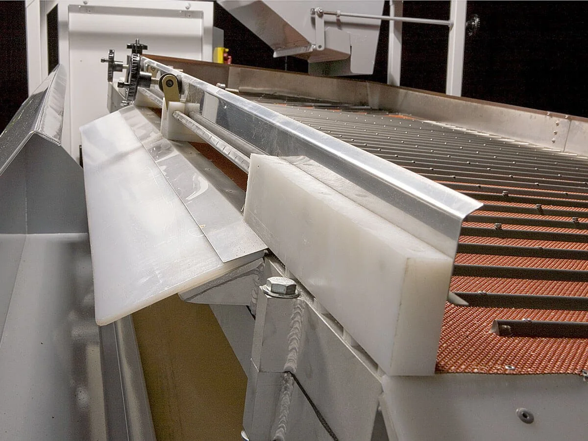 Oliver gravity separator deck and discharge components undergoing factory refurbishing