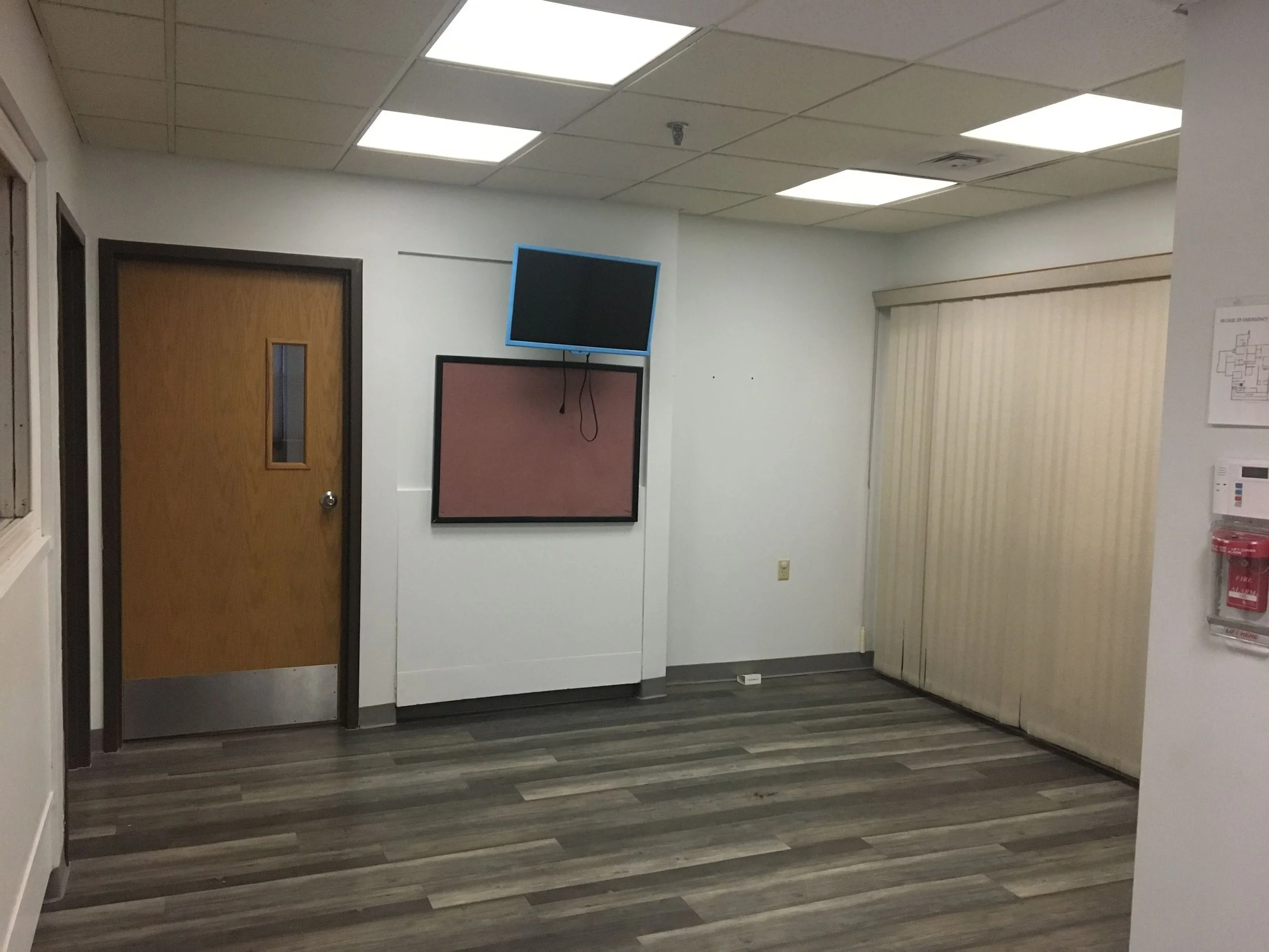 Conveniently located at 111 South Cliff Street in Suite 1A, this expansive 3,000 square foot space presents a wide array of amenities, including double entrances, a welcoming reception area equipped with a window and a message board monitor. The prop