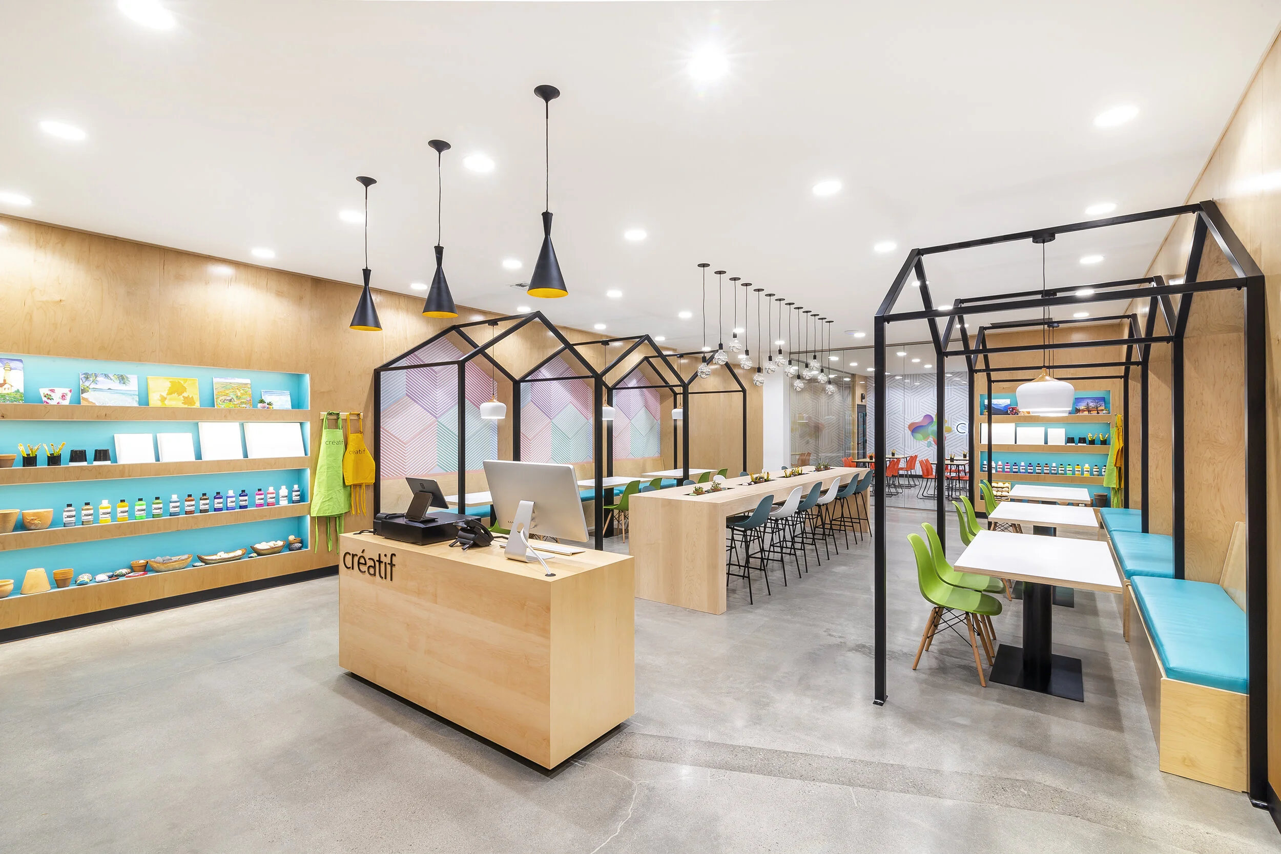 A contemporary retail art instruction studio.