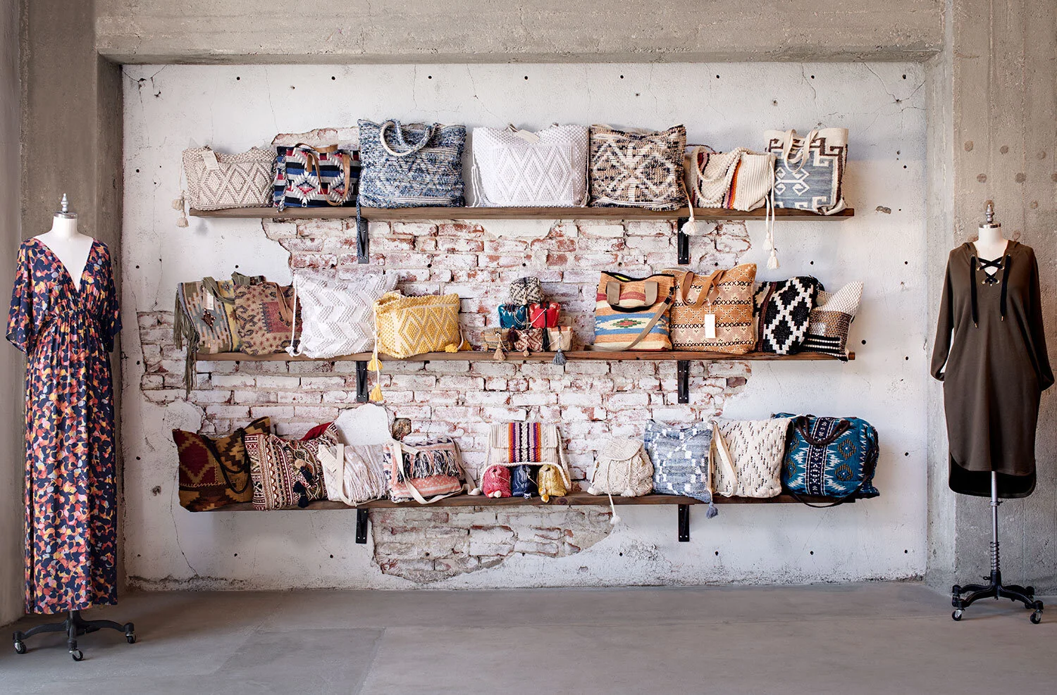 Reclaimed wood shelves on a distress brick wall in a cool retail store