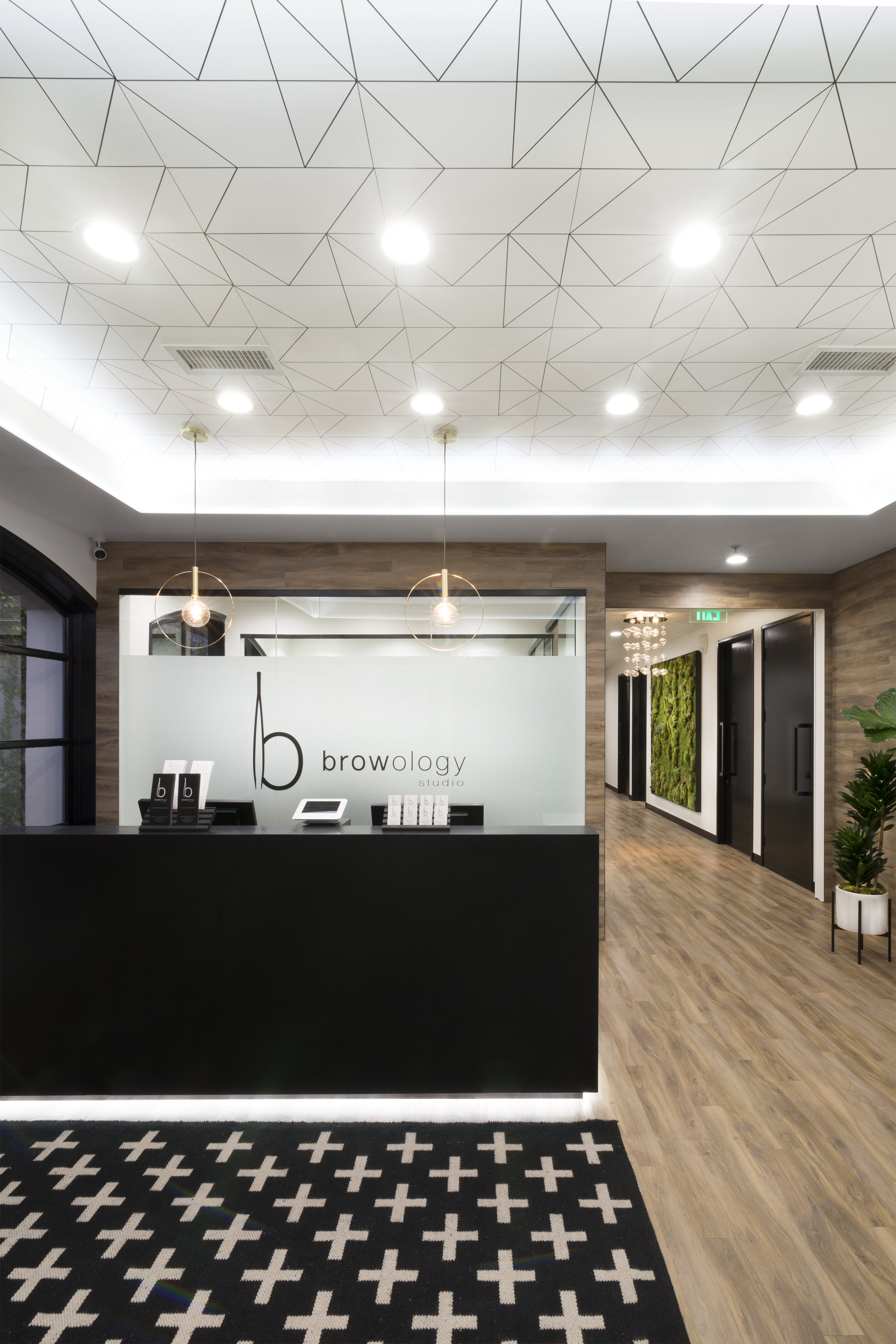 Sleek reception area at med spa and brow studio.