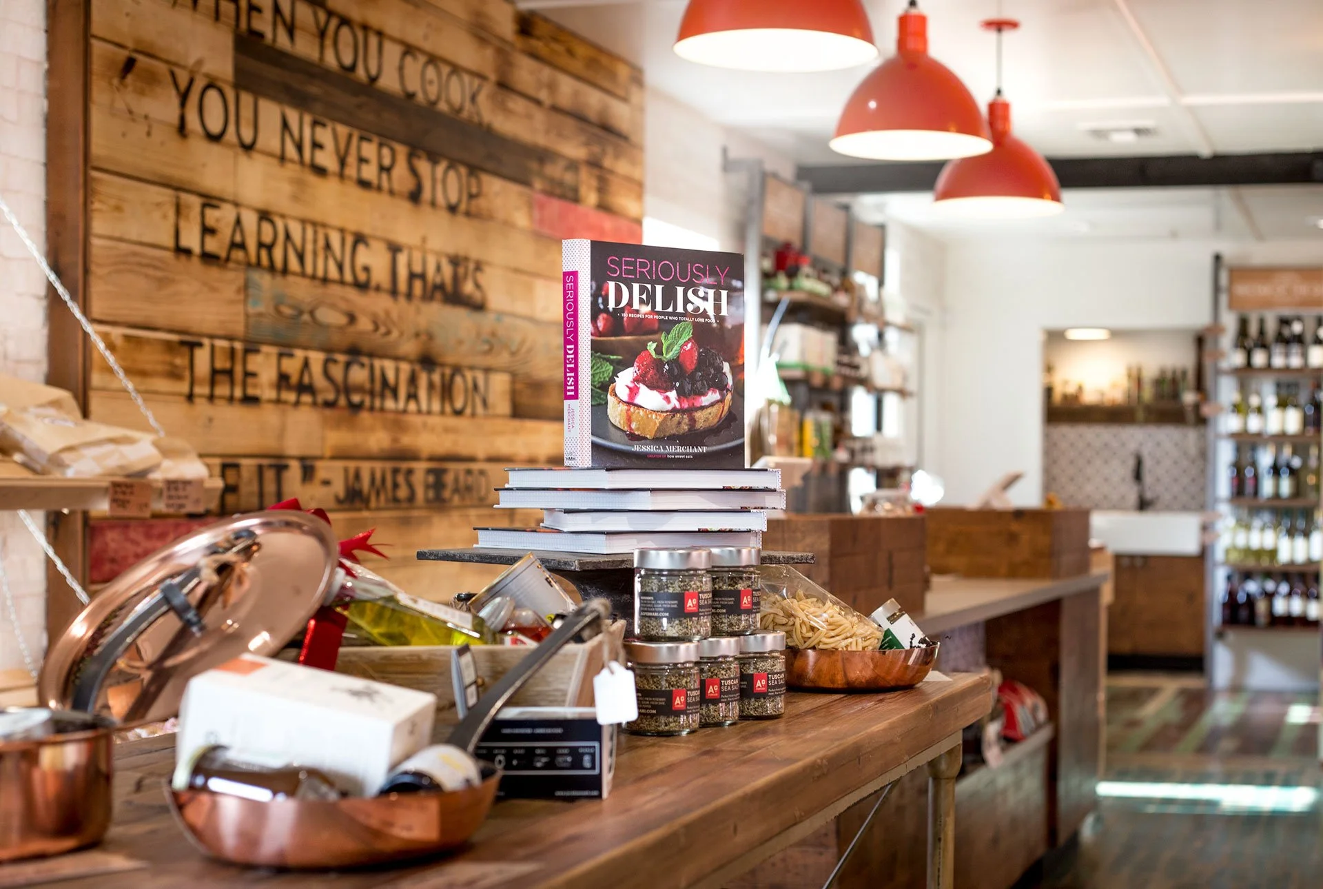 Wood plank accent wall in a gourmet food shop design