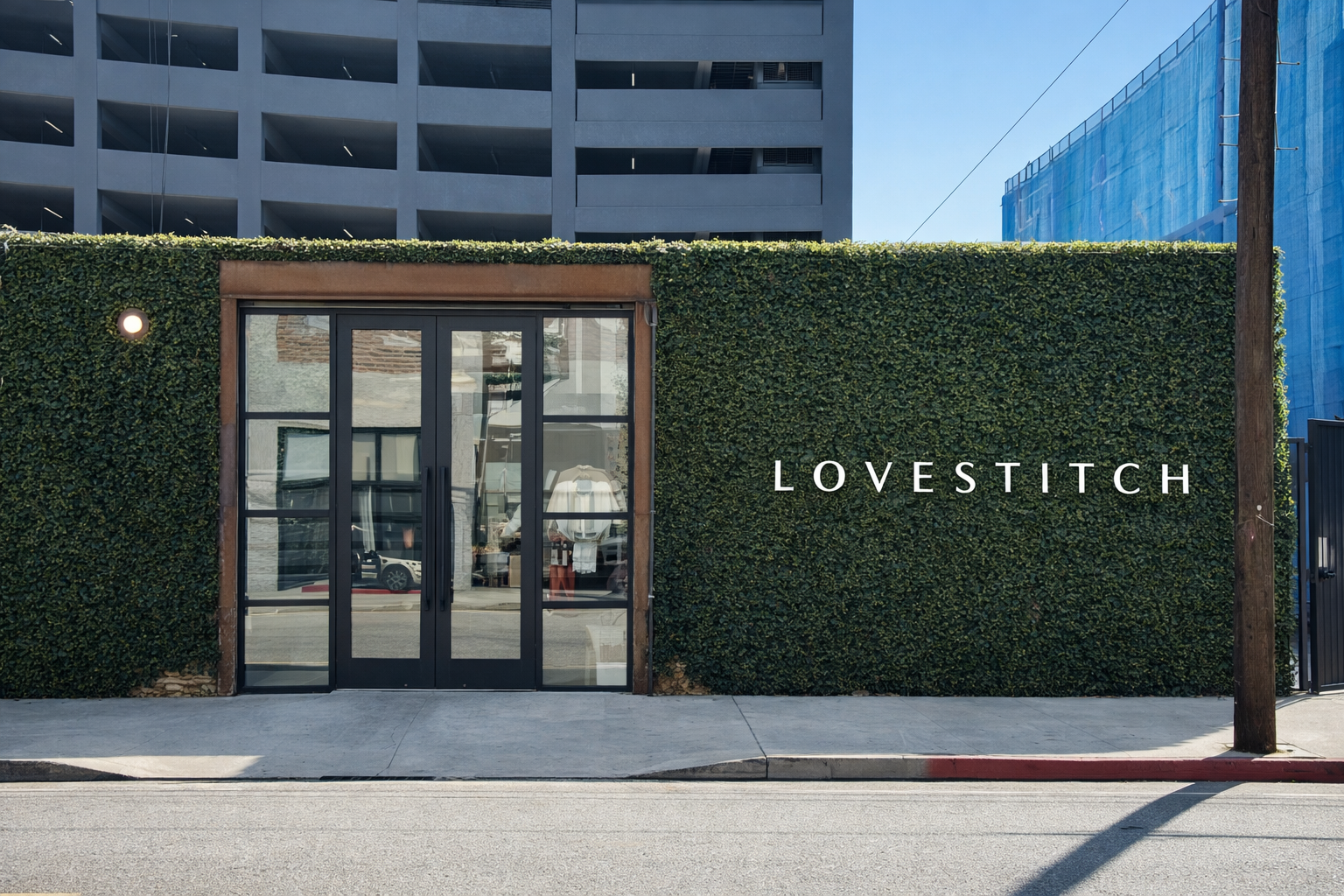 Ivy covered exterior of Lovestitch retail store downtown Los Angeles