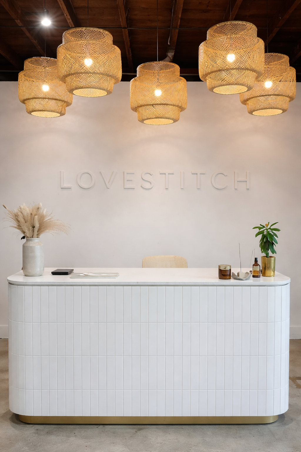 Monochromatic retail cash wrap and brand accent wall.