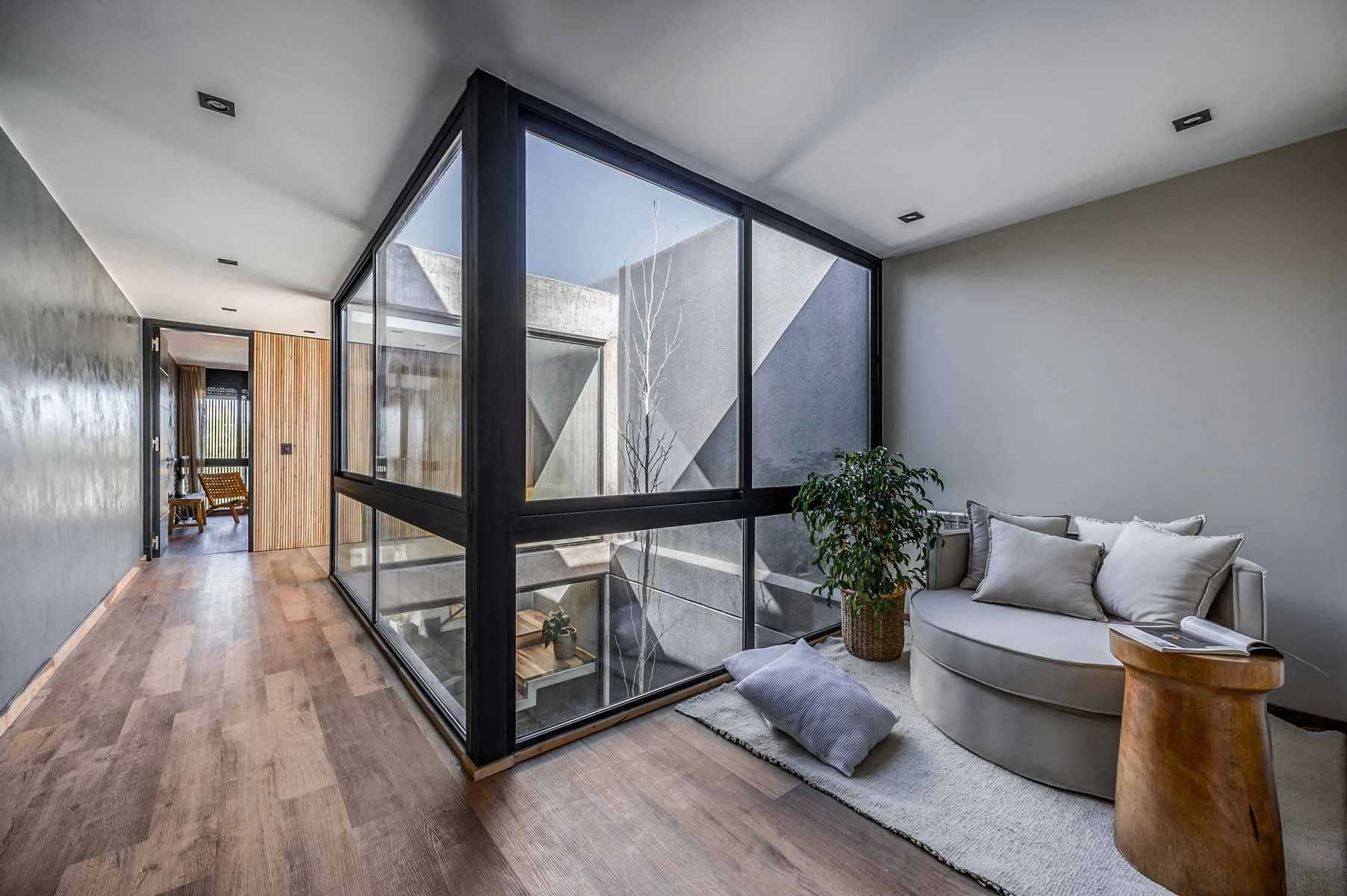 Modernist home with glass atrium,