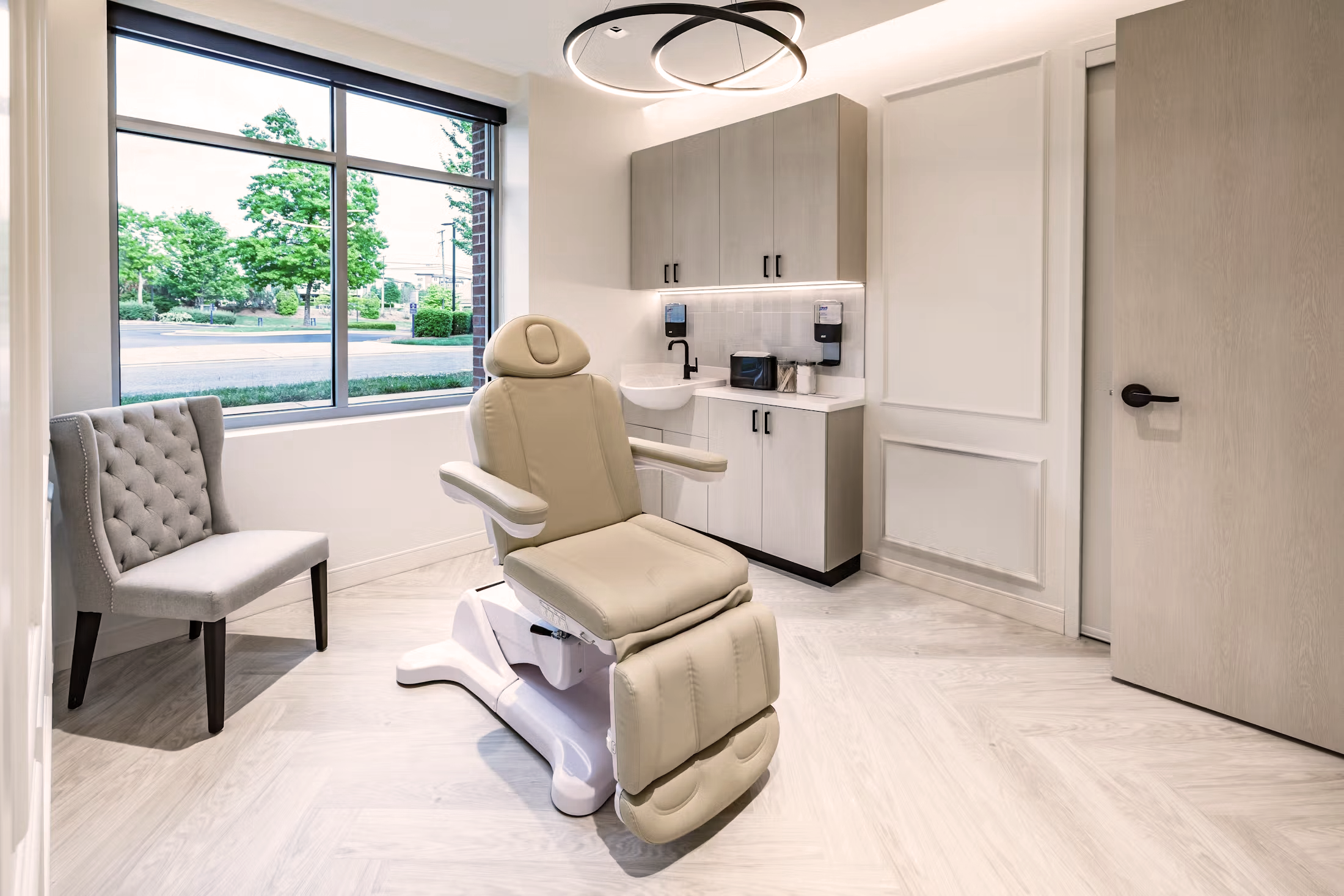 A contemporary exam room at a doctor's office.